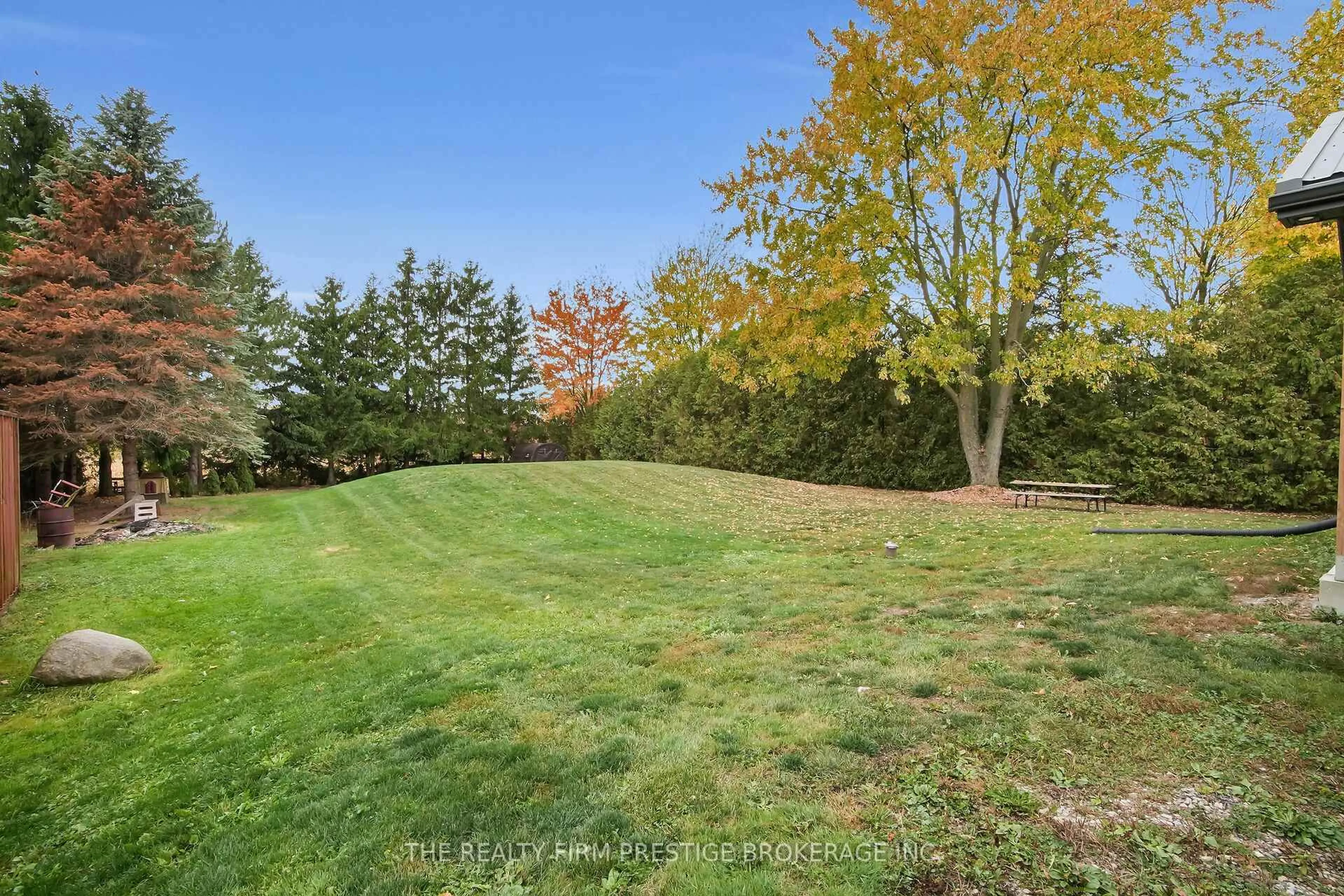 A pic from outside/outdoor area/front of a property/back of a property/a pic from drone, forest/trees view for 23473 Wonderland Rd, Middlesex Centre Ontario N0M 1P0