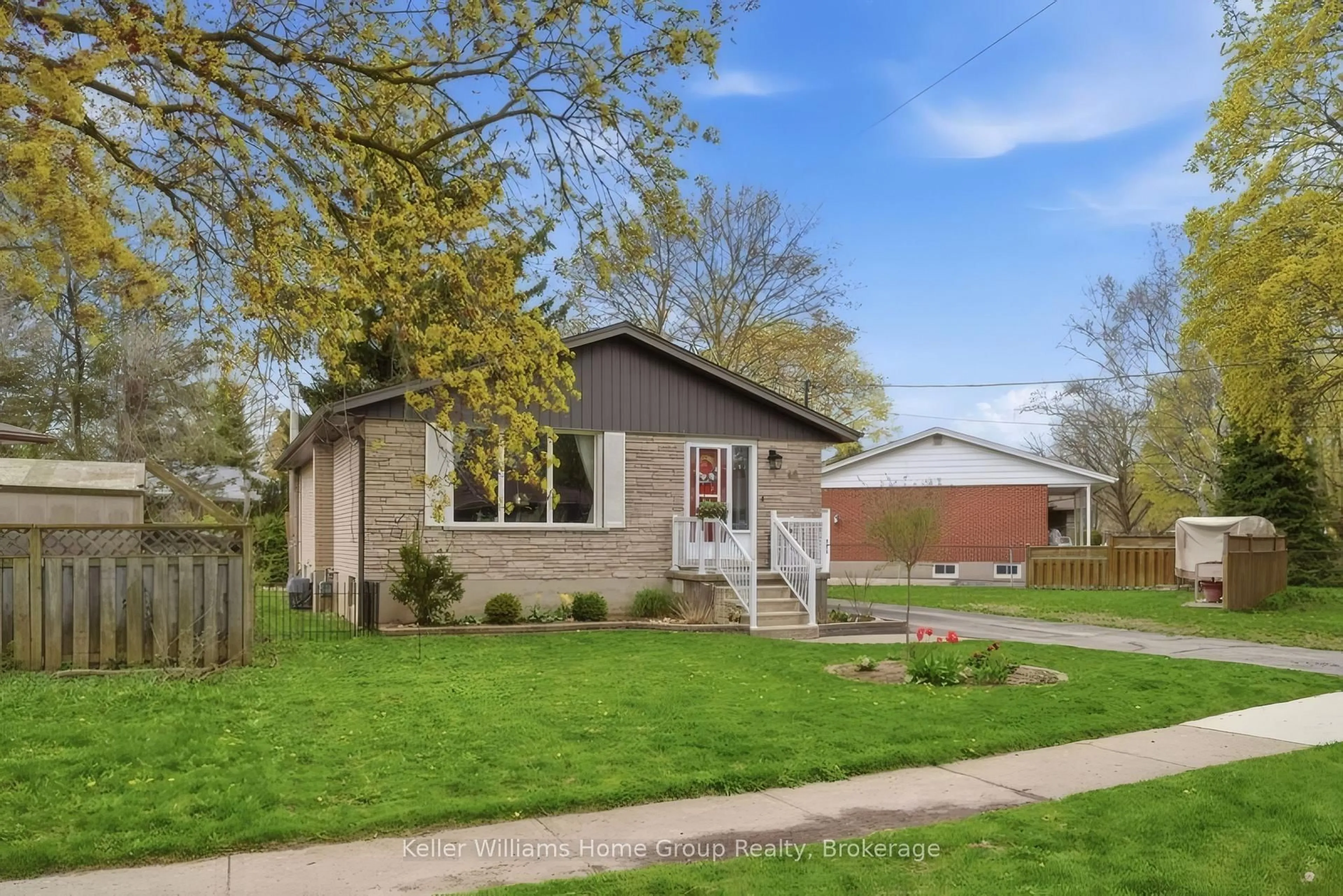 Home with vinyl exterior material, street for 48 Sunnylea Cres, Guelph Ontario N1E 1W4