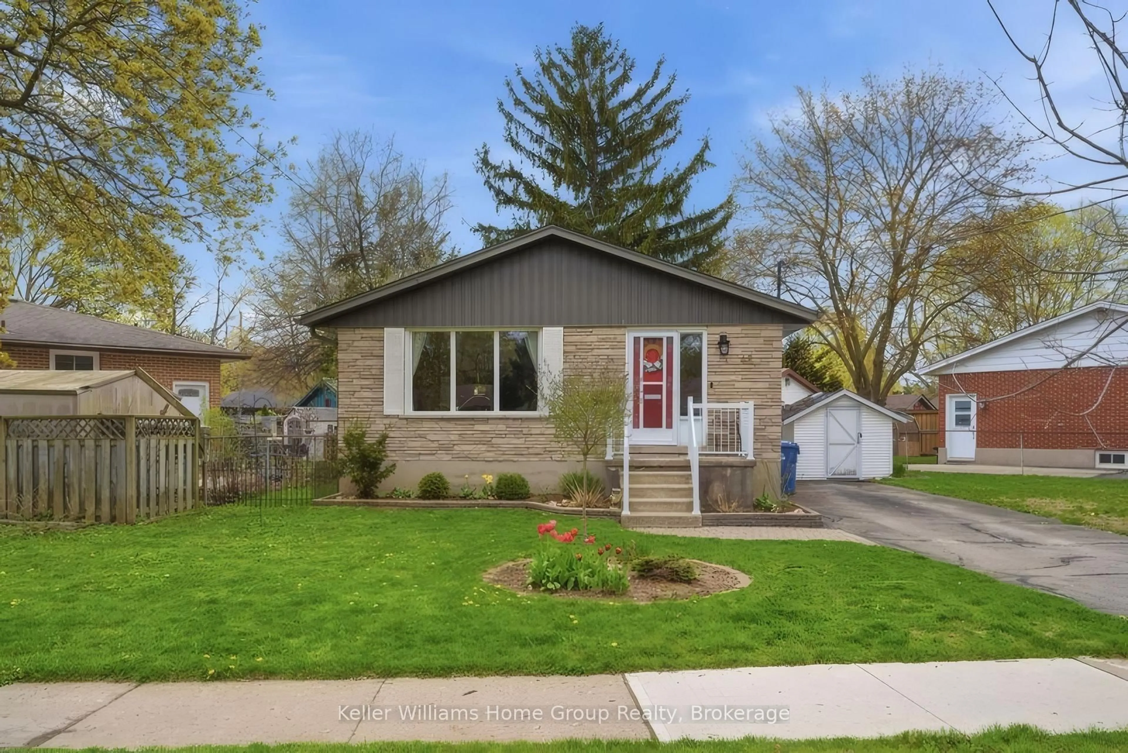 Home with brick exterior material, street for 48 Sunnylea Cres, Guelph Ontario N1E 1W4