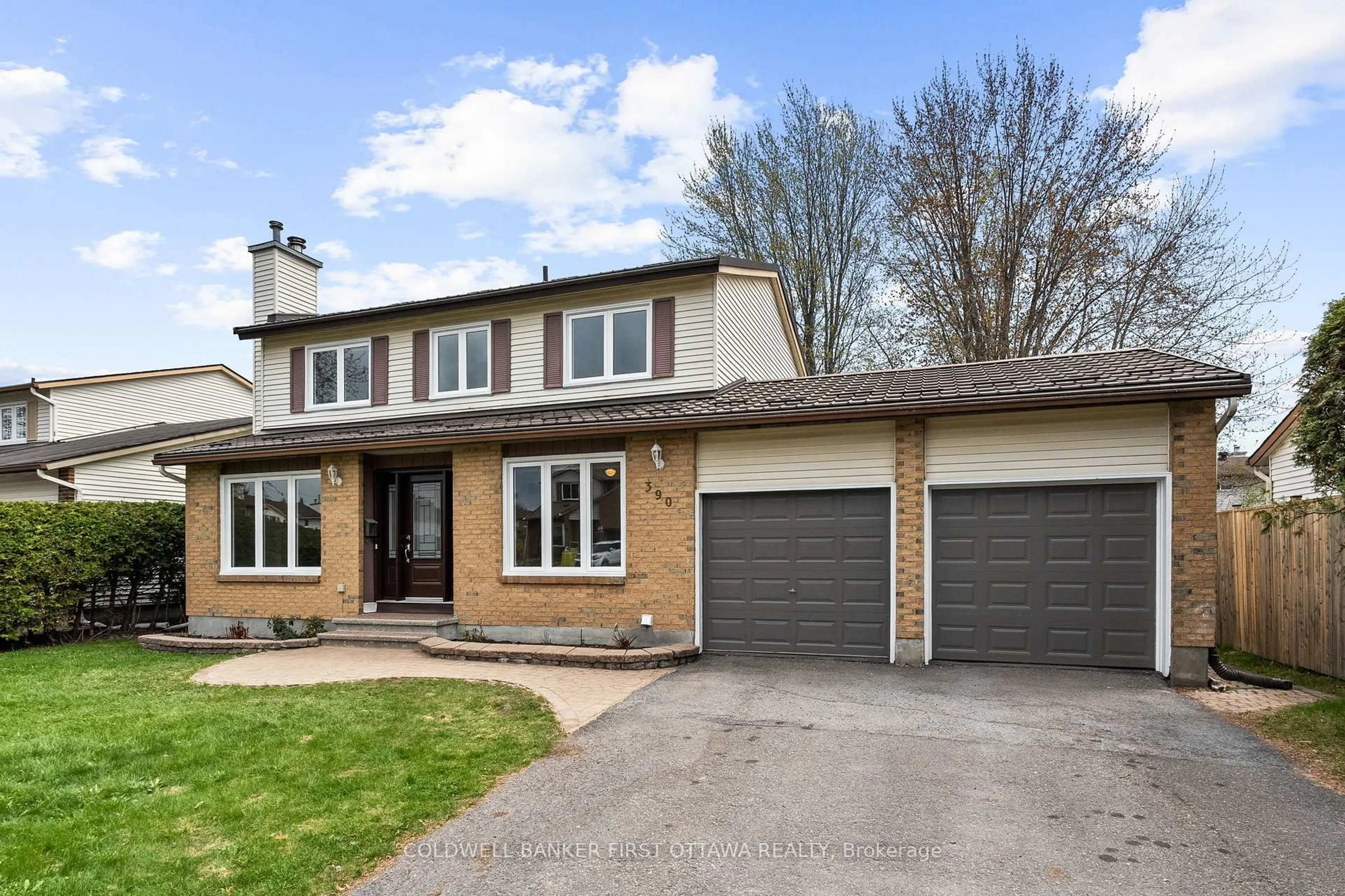 Home with brick exterior material, street for 390 Cloverheath Cres, Ottawa Ontario K1E 2R8