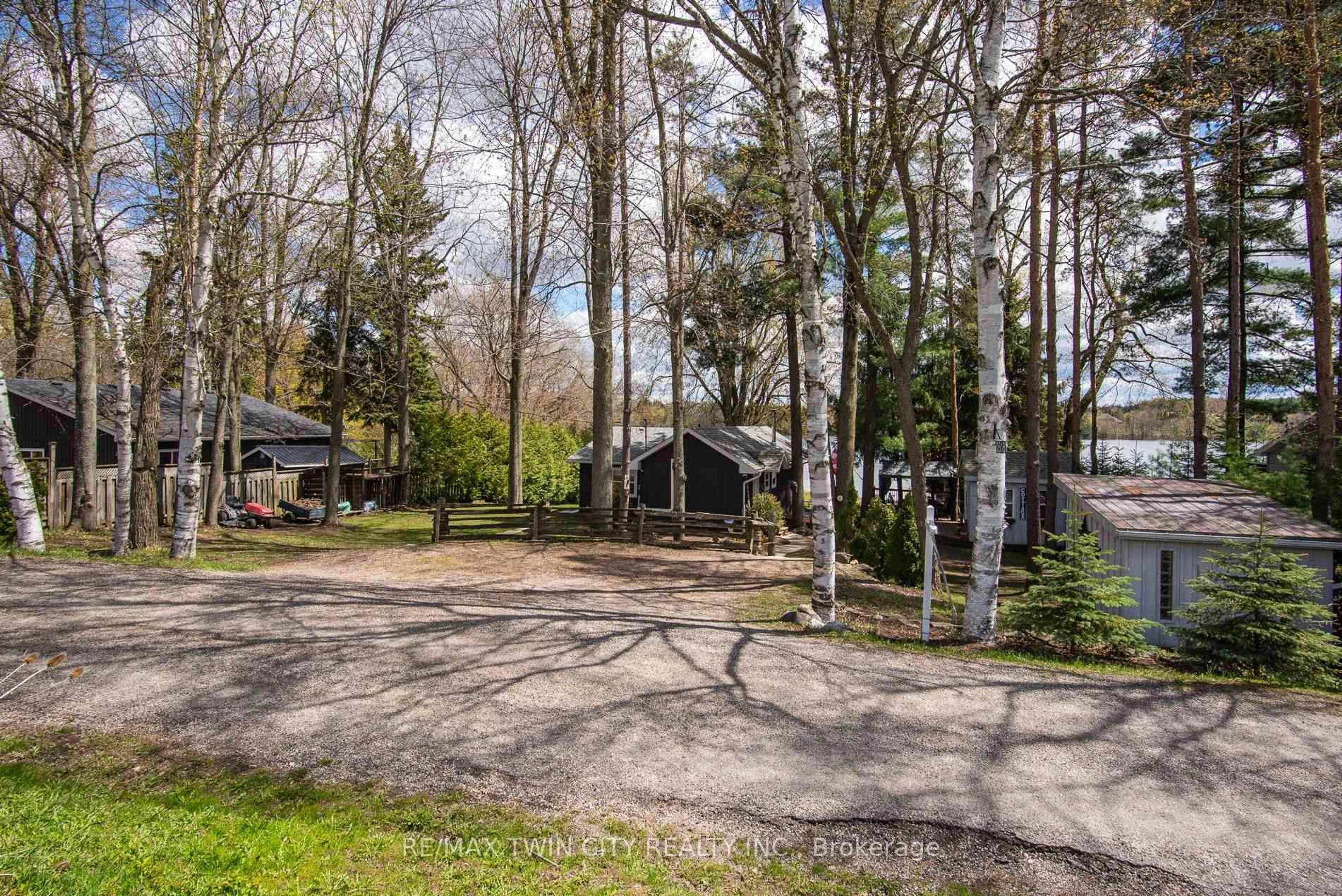 A pic from outside/outdoor area/front of a property/back of a property/a pic from drone, forest/trees view for 516 Fifth St, Centre Wellington Ontario N0B 1J0