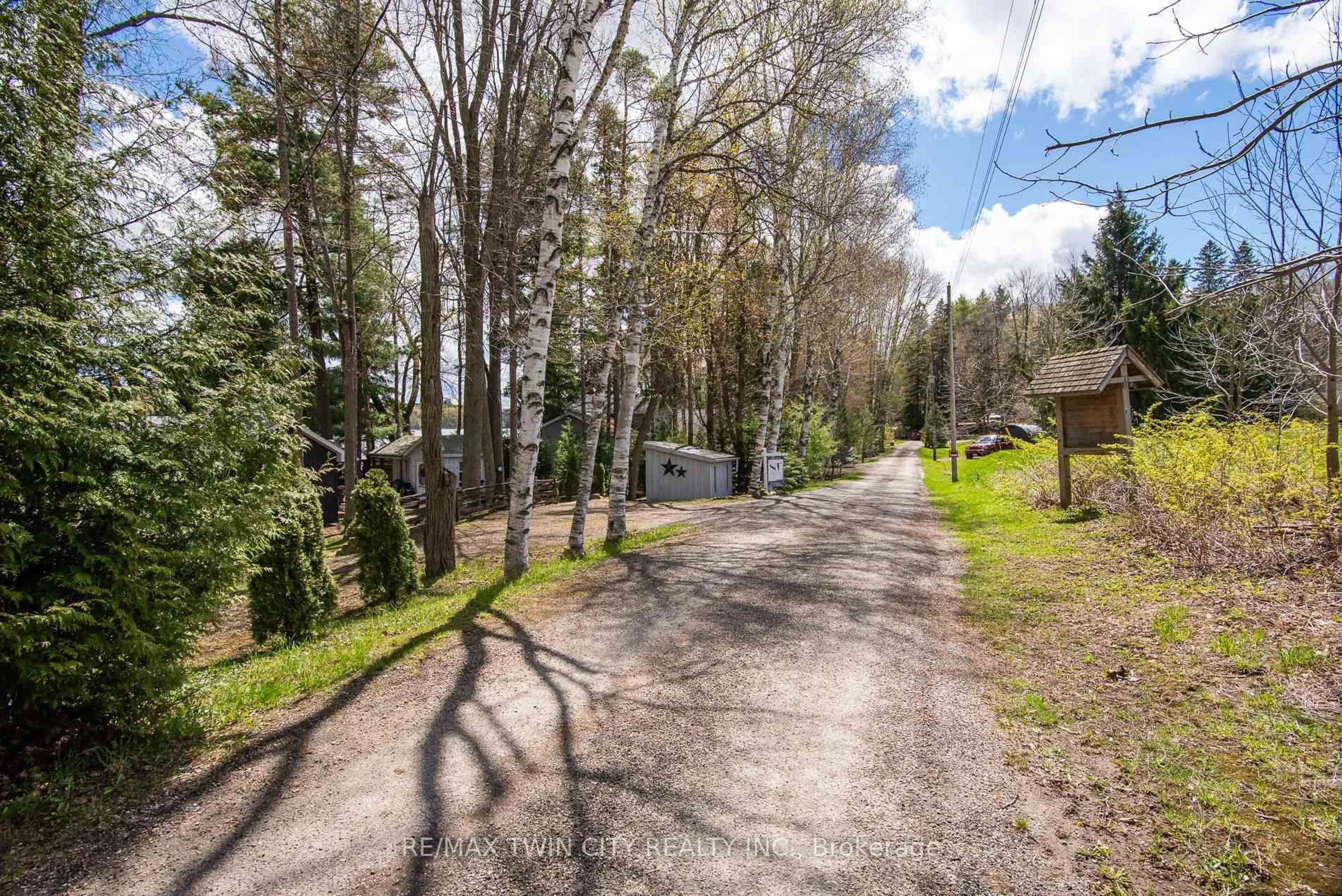 A pic from outside/outdoor area/front of a property/back of a property/a pic from drone, forest/trees view for 516 Fifth St, Centre Wellington Ontario N0B 1J0