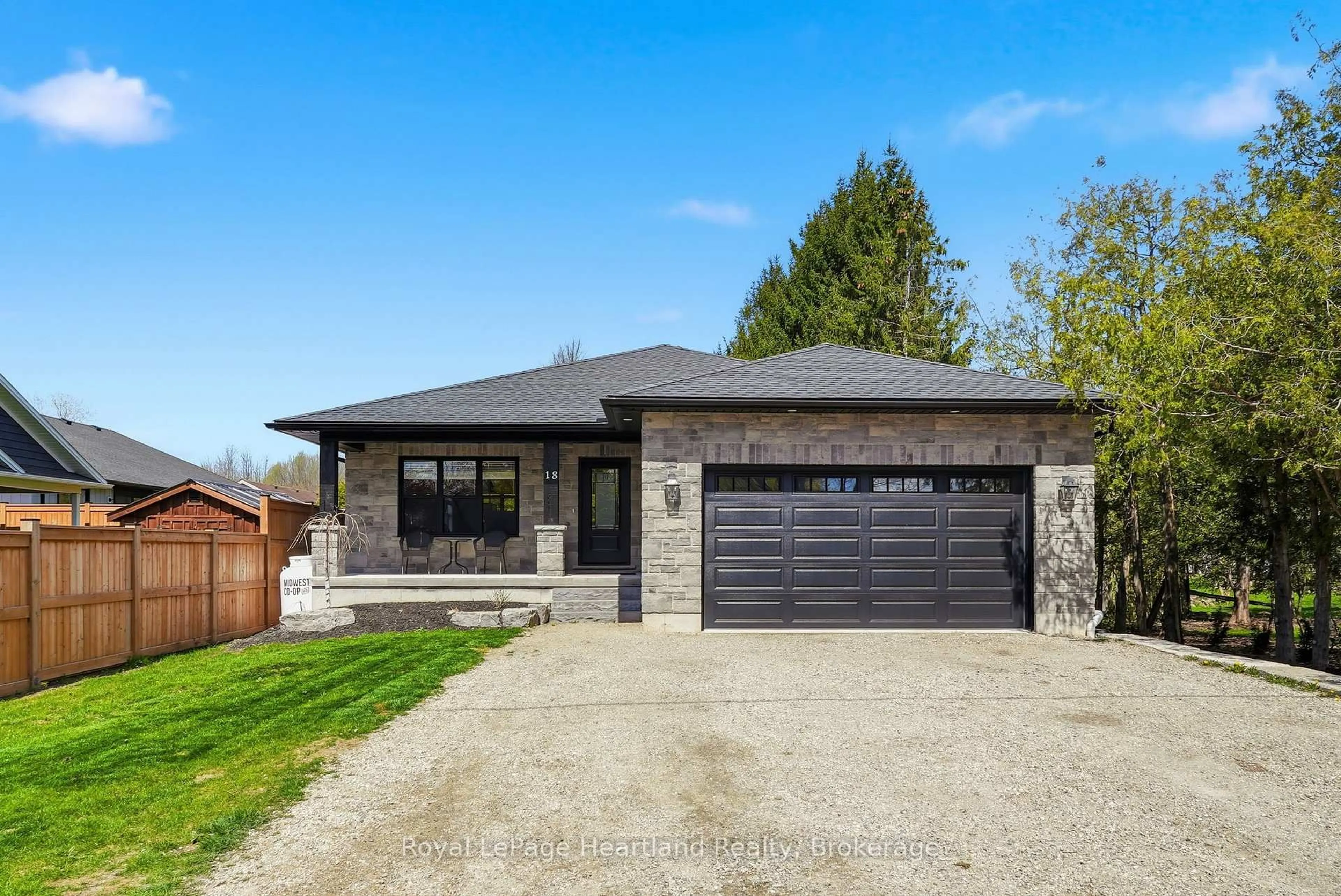 Home with brick exterior material, street for 18 Geddes St, Minto Ontario N0G 1M0