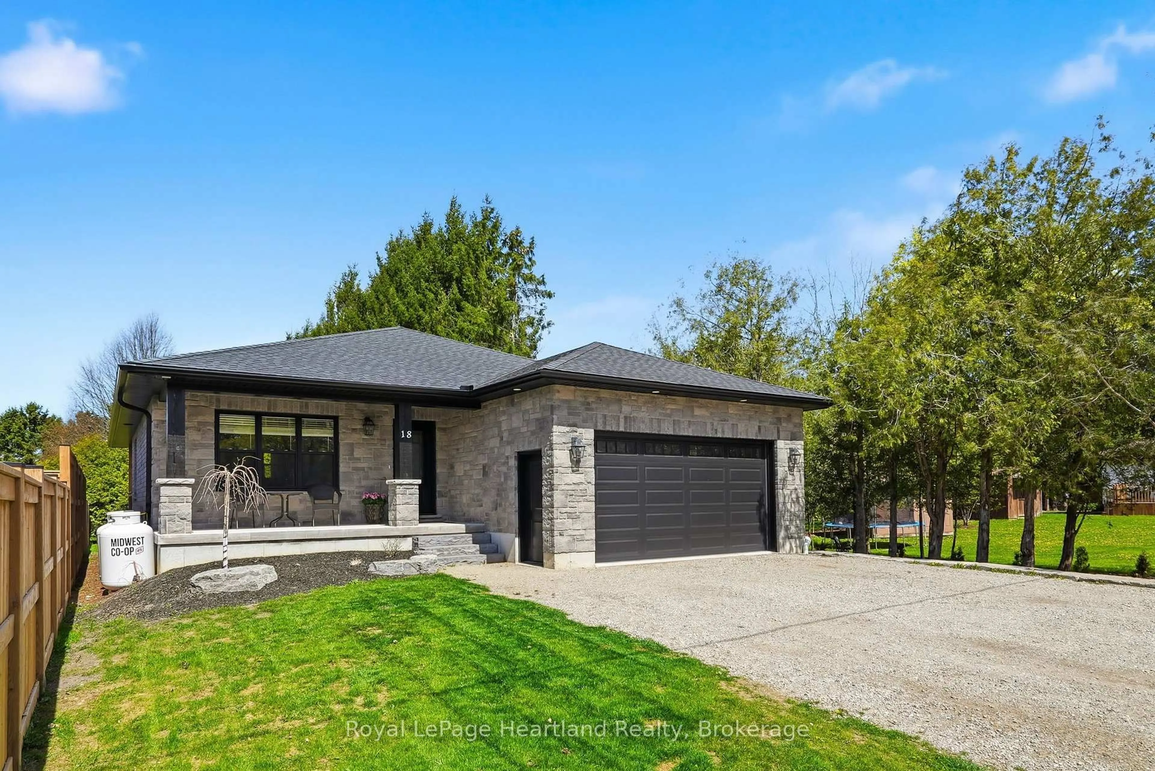 Home with brick exterior material, street for 18 Geddes St, Minto Ontario N0G 1M0