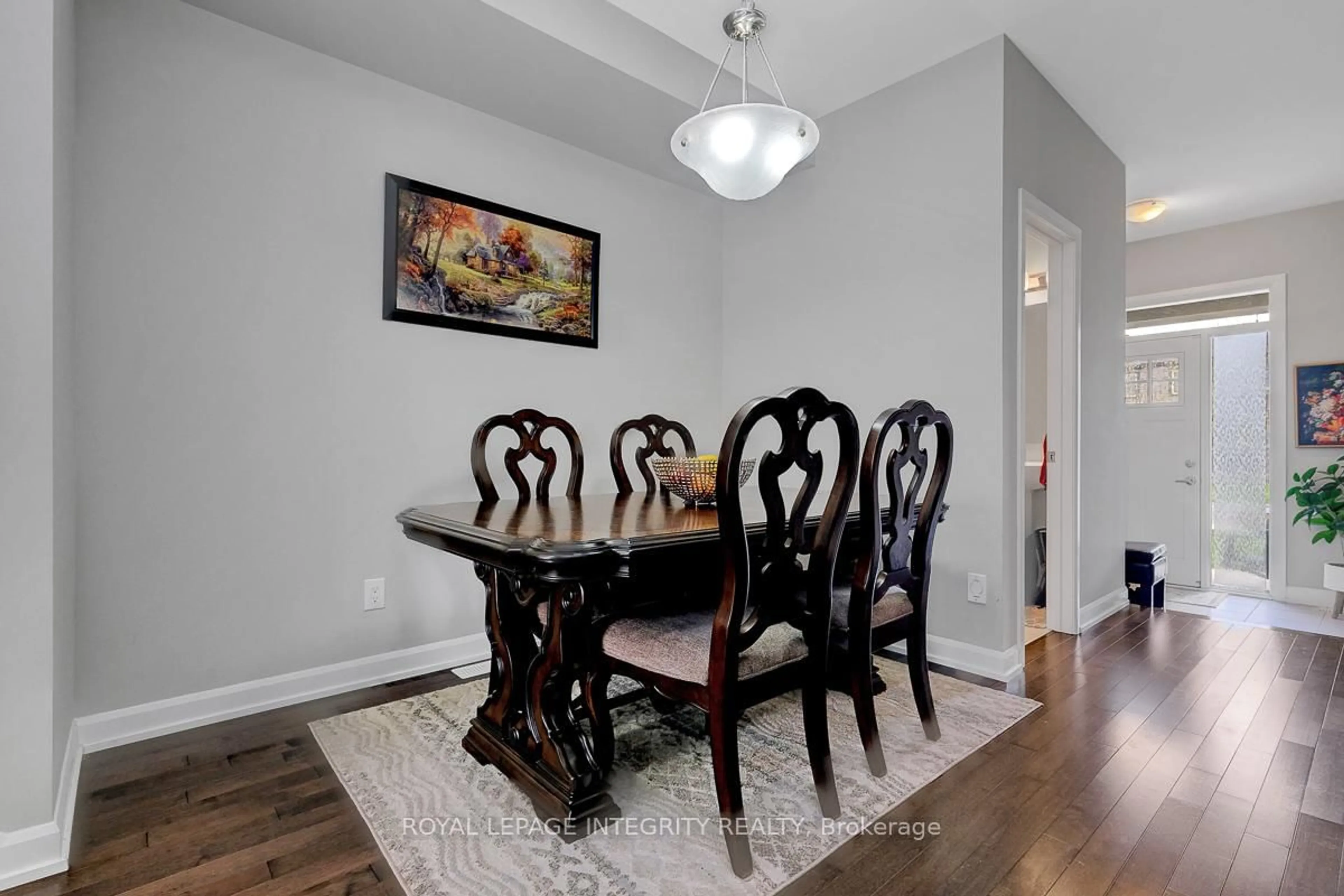 Dining room, wood/laminate floor for 152 Gardenpost Terr, Ottawa Ontario K4A 5G9