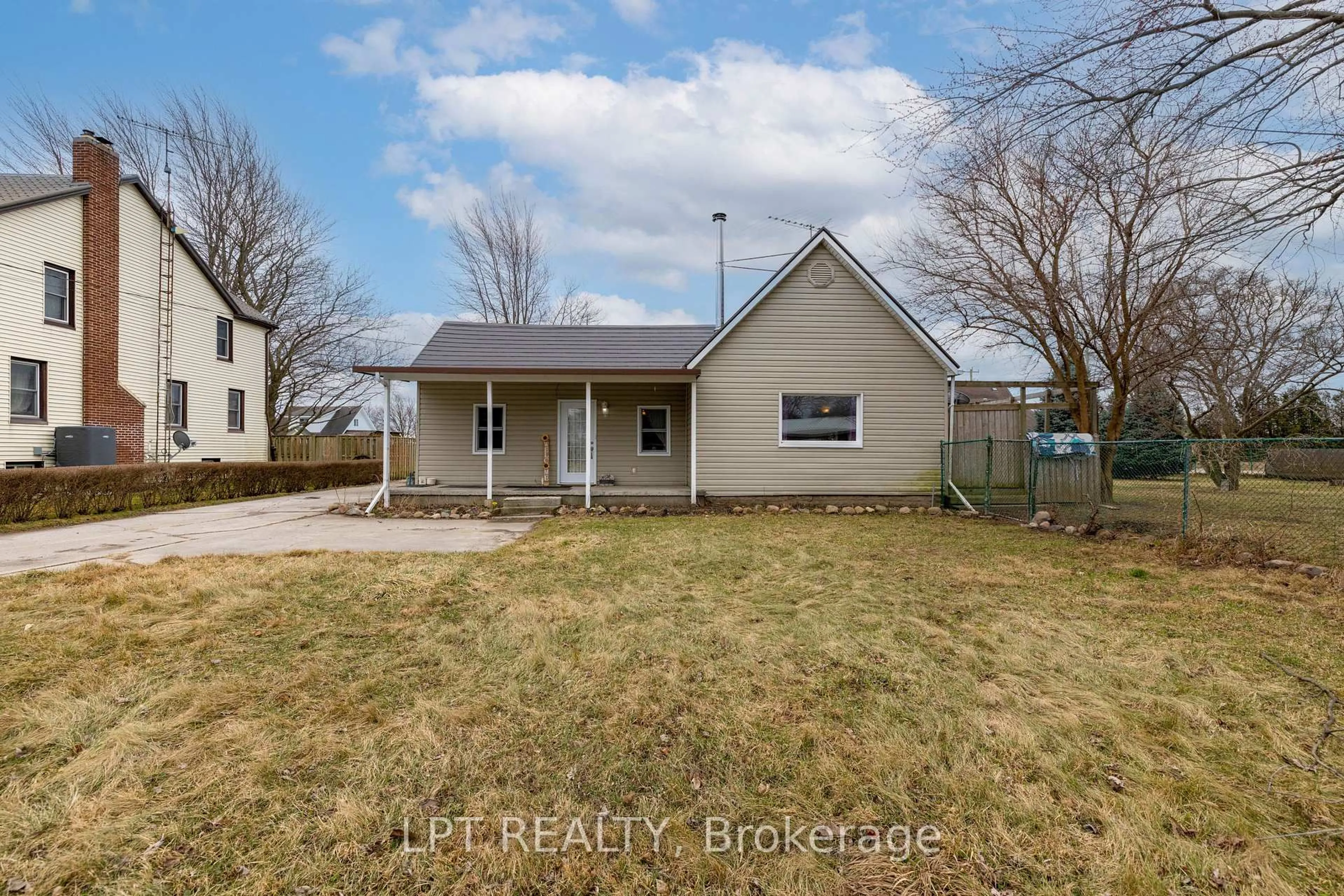 A pic from outside/outdoor area/front of a property/back of a property/a pic from drone, street for 19 John Park Line #Tupperville, Chatham-Kent Ontario N0P 2M0