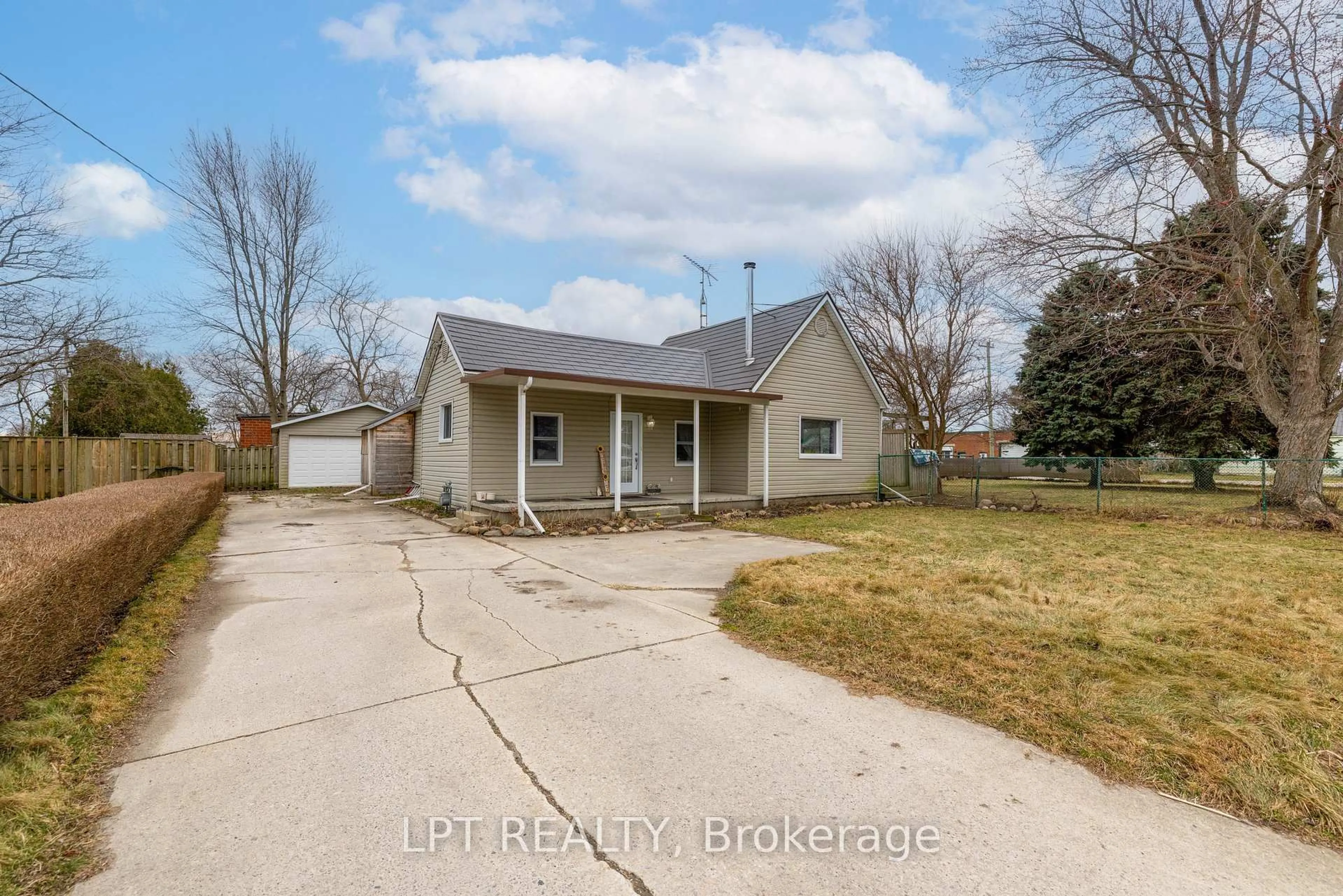 A pic from outside/outdoor area/front of a property/back of a property/a pic from drone, street for 19 John Park Line #Tupperville, Chatham-Kent Ontario N0P 2M0