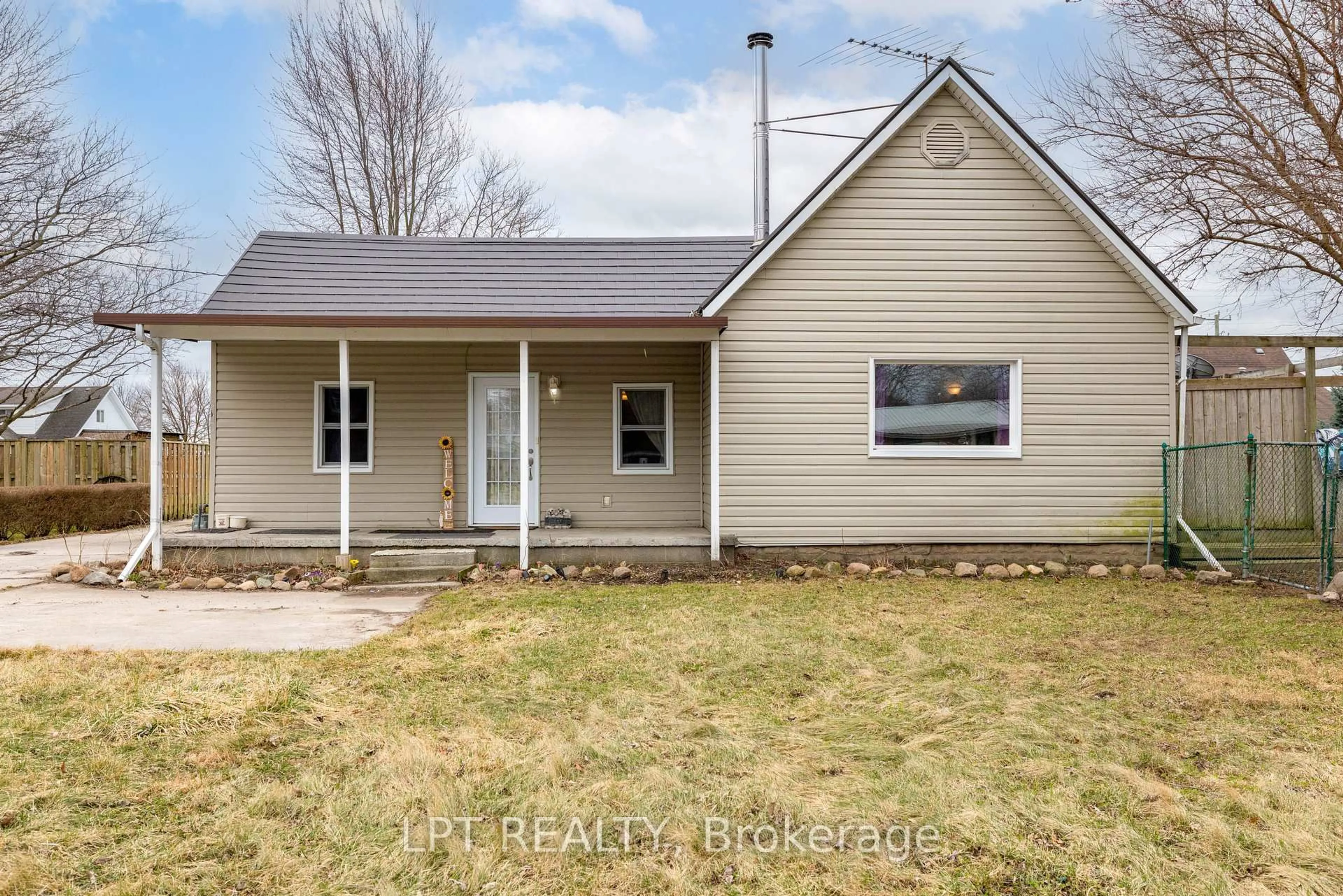 Home with vinyl exterior material, street for 19 John Park Line #Tupperville, Chatham-Kent Ontario N0P 2M0