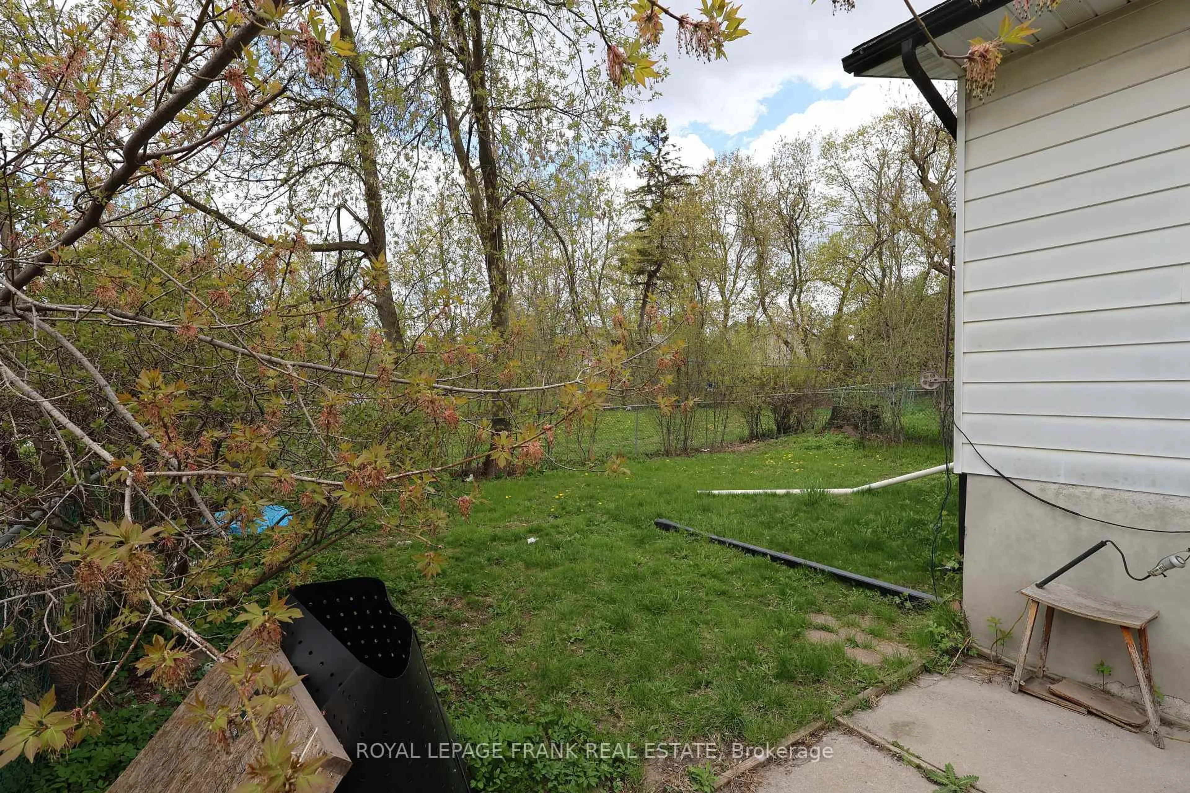 A pic from outside/outdoor area/front of a property/back of a property/a pic from drone, forest/trees view for 294 Parkhill Rd, Peterborough Ontario K9H 3H7