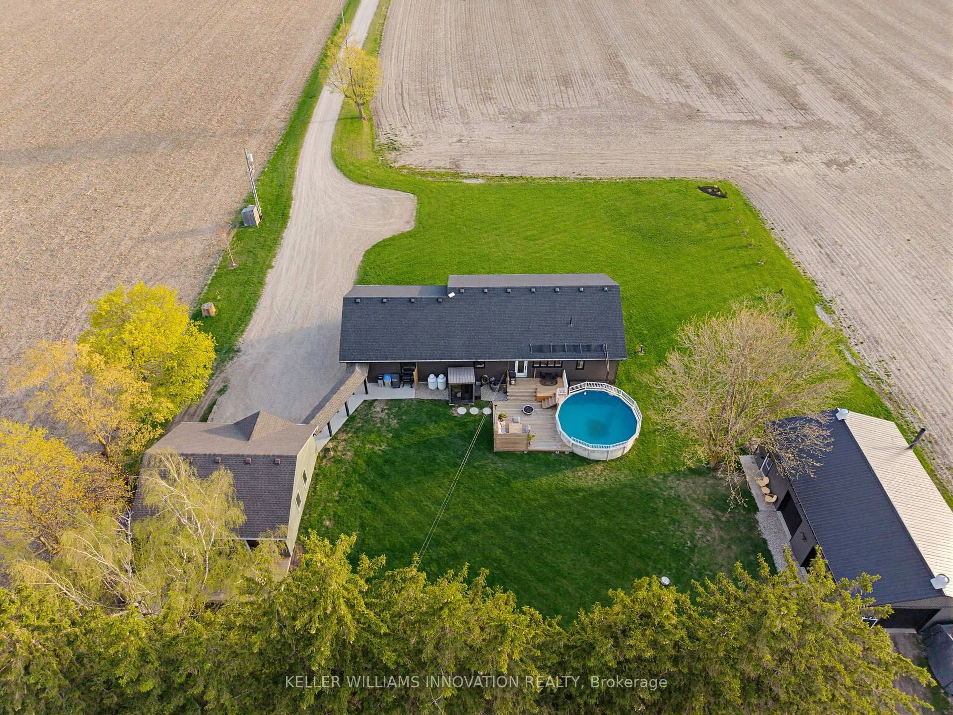 A pic from outside/outdoor area/front of a property/back of a property/a pic from drone, water/lake/river/ocean view for 6342 Line 60 Line, North Perth Ontario N0K 1P0