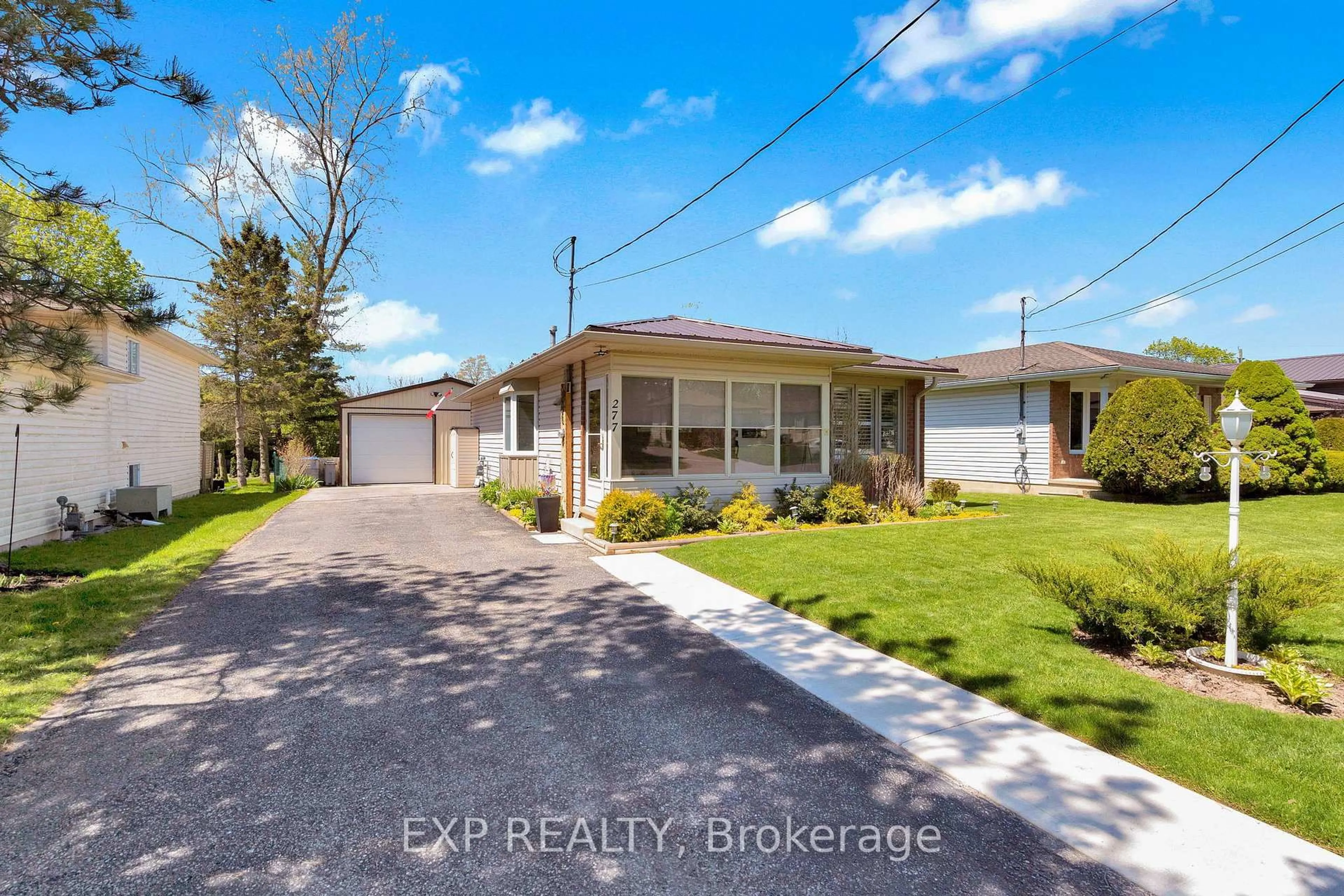 A pic from outside/outdoor area/front of a property/back of a property/a pic from drone, street for 277 Station St, North Middlesex Ontario N0M 2K0
