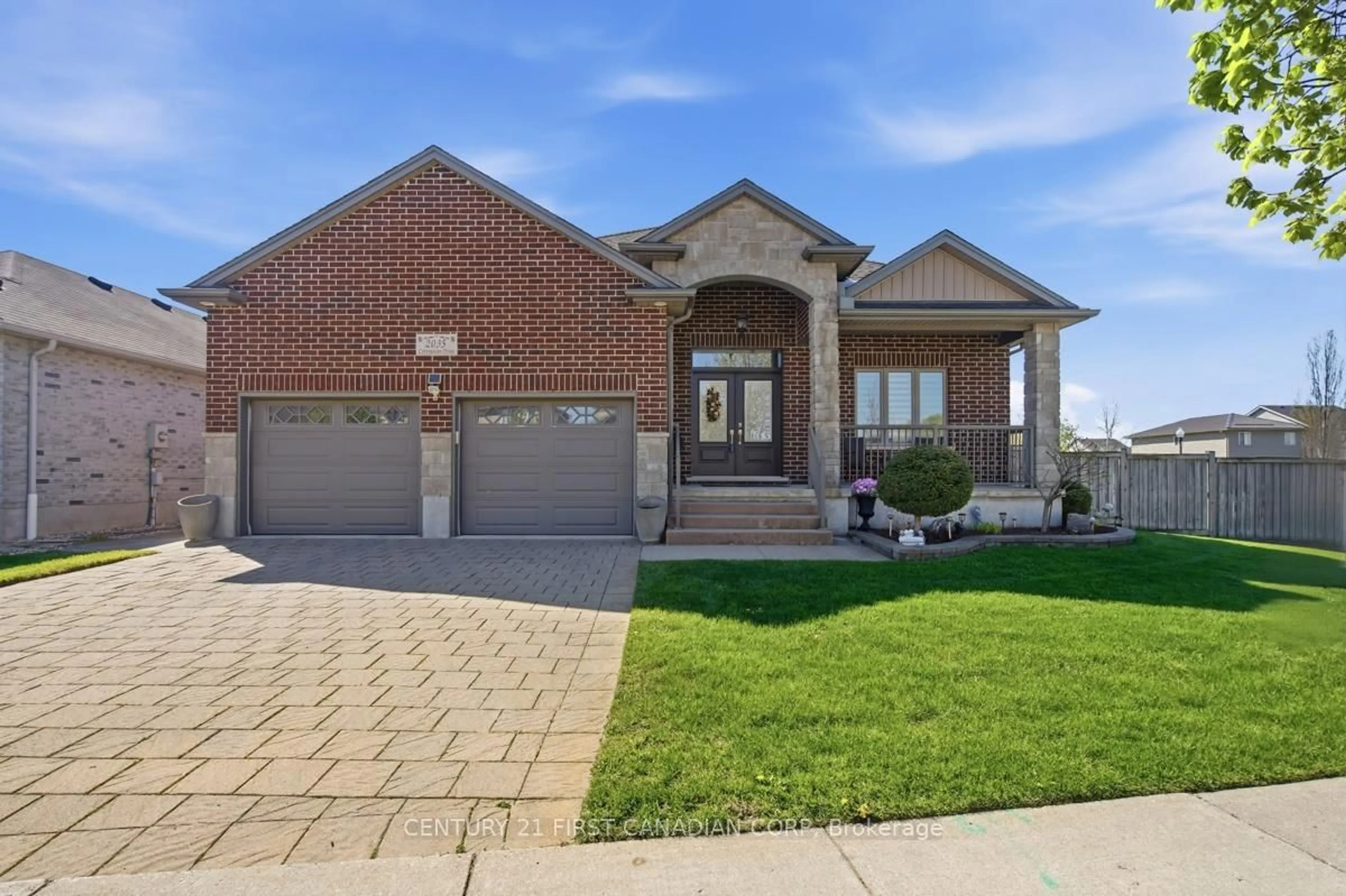 Home with brick exterior material, street for 2035 Coronation Dr, London North Ontario N6G 0B5