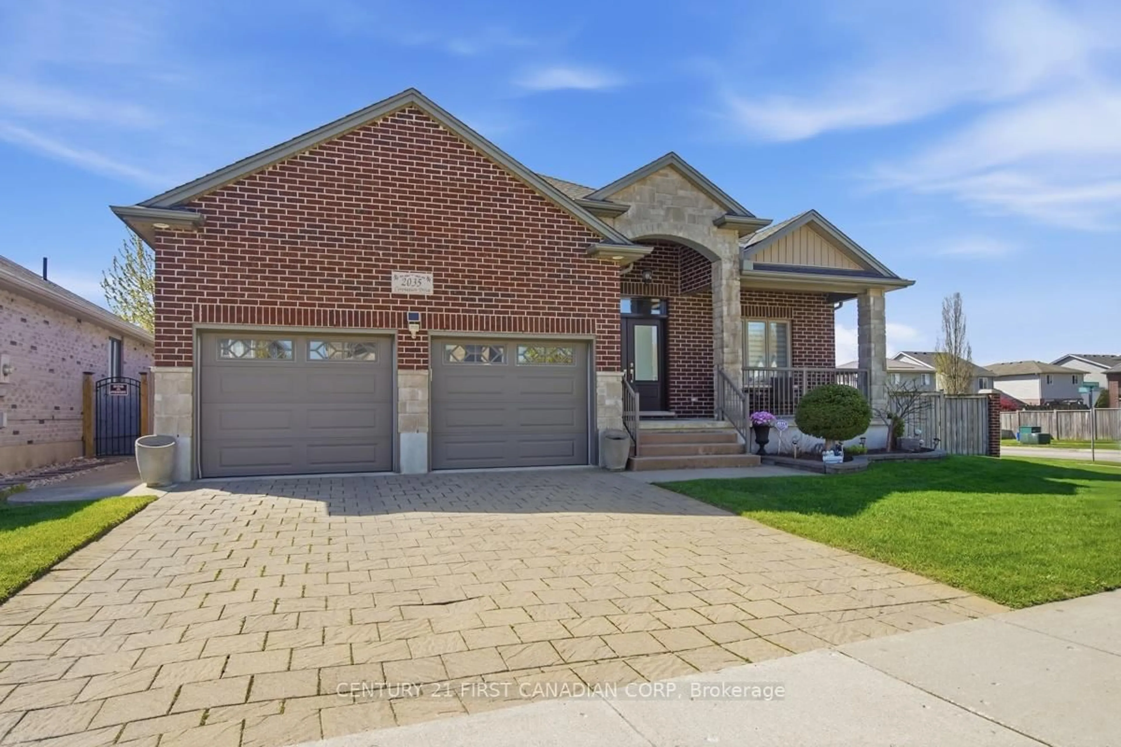 Home with brick exterior material, street for 2035 Coronation Dr, London North Ontario N6G 0B5