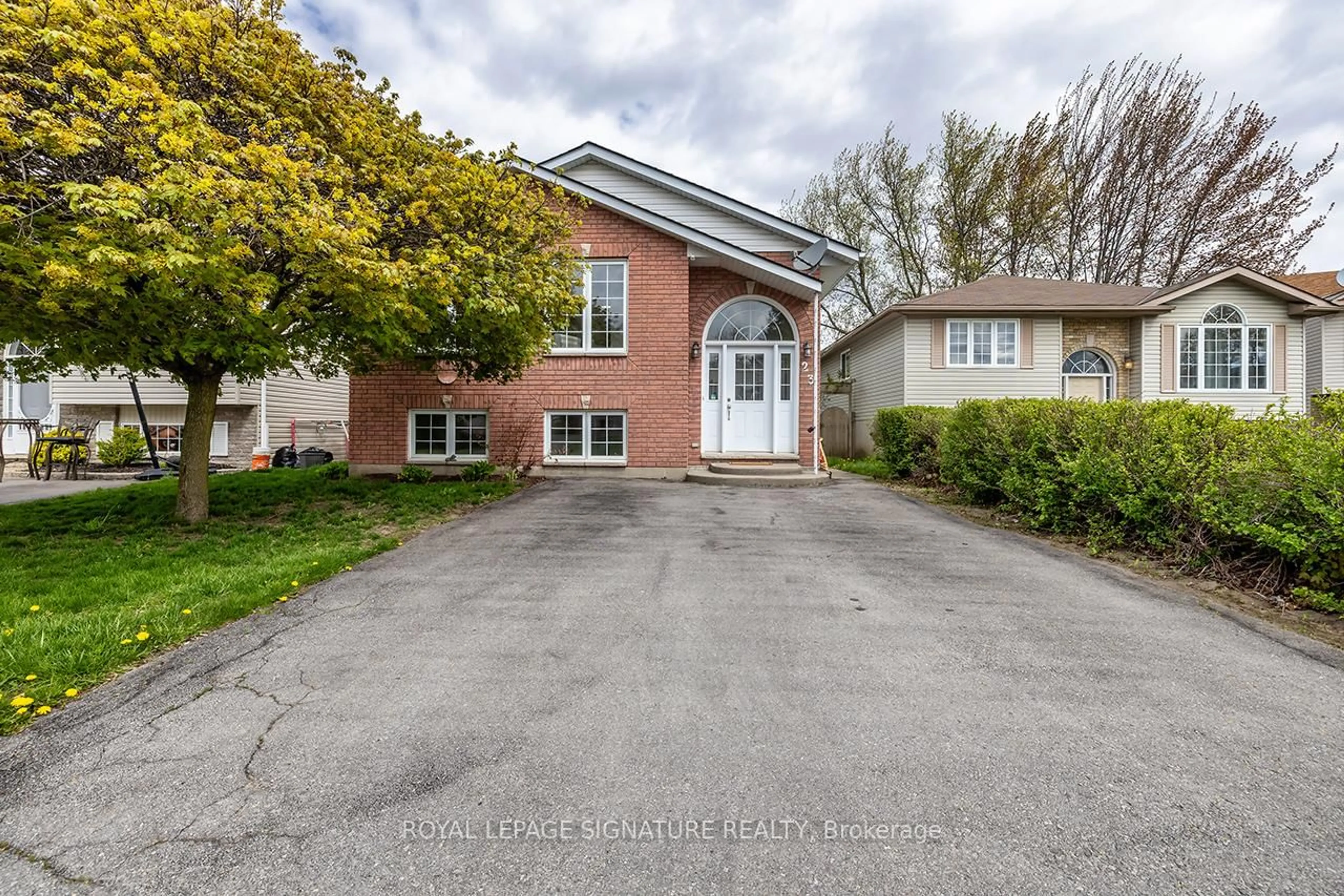 Home with brick exterior material, street for 23 Faraday Gdns, Belleville Ontario K8P 5J5