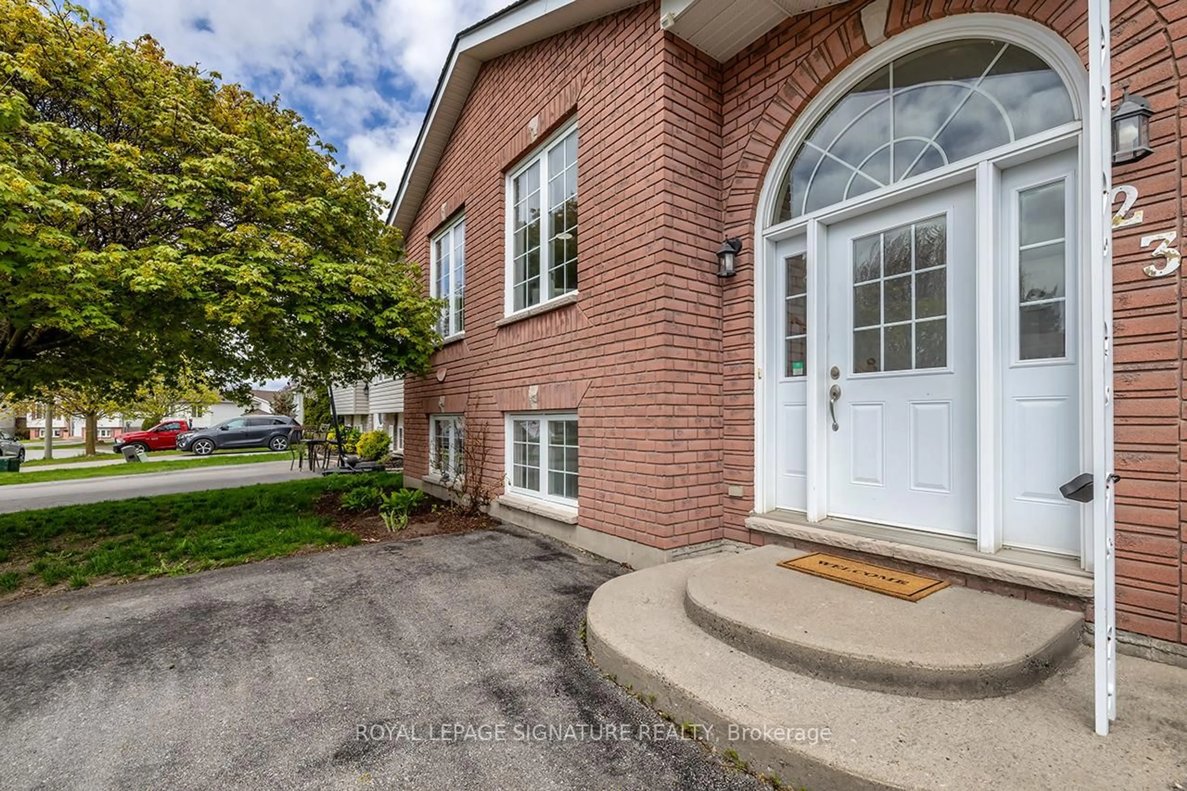 Home with brick exterior material, street for 23 Faraday Gdns, Belleville Ontario K8P 5J5