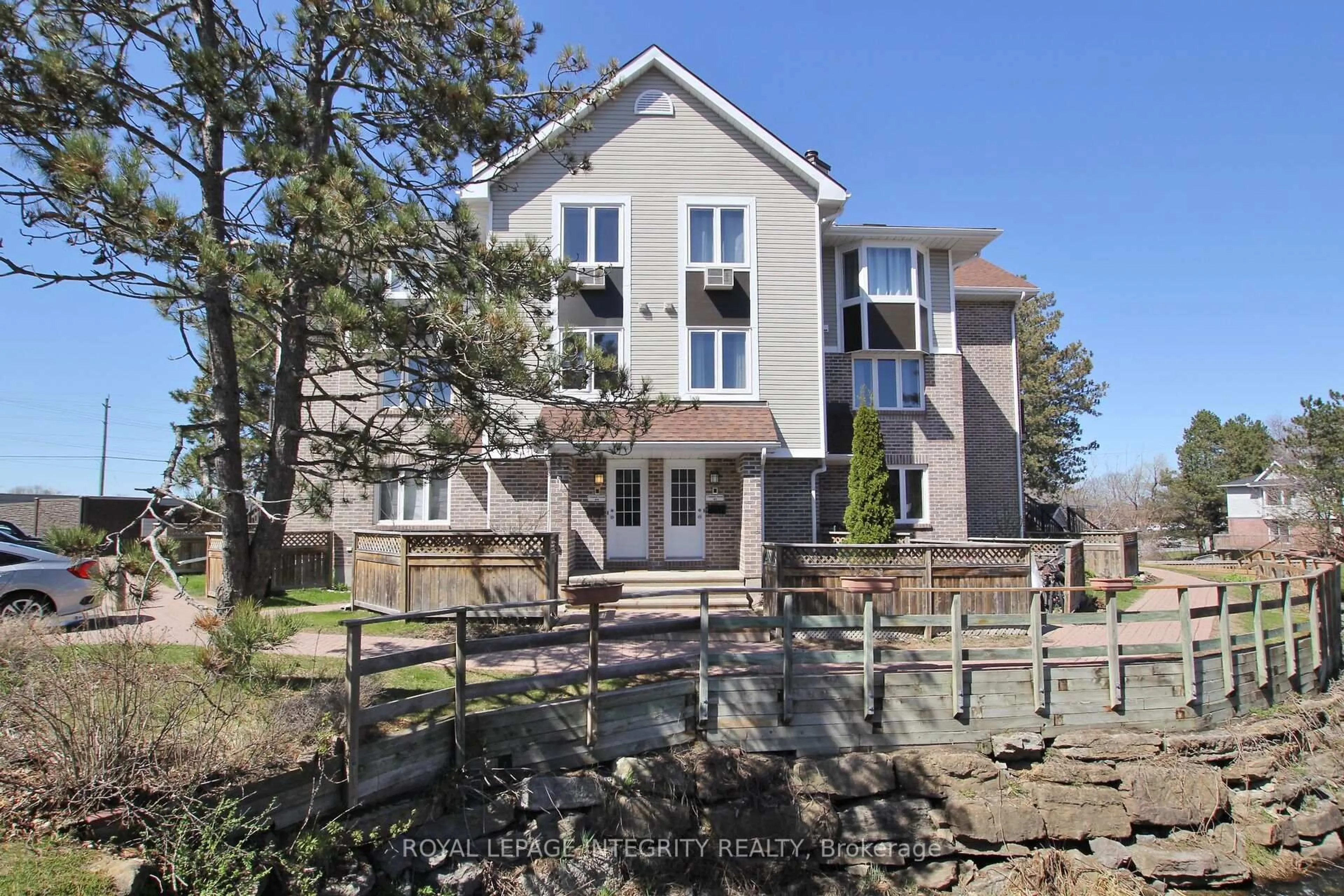 A pic from outside/outdoor area/front of a property/back of a property/a pic from drone, water/lake/river/ocean view for 3 STONEBANK Cres #10, Ottawa Ontario K2H 9M2
