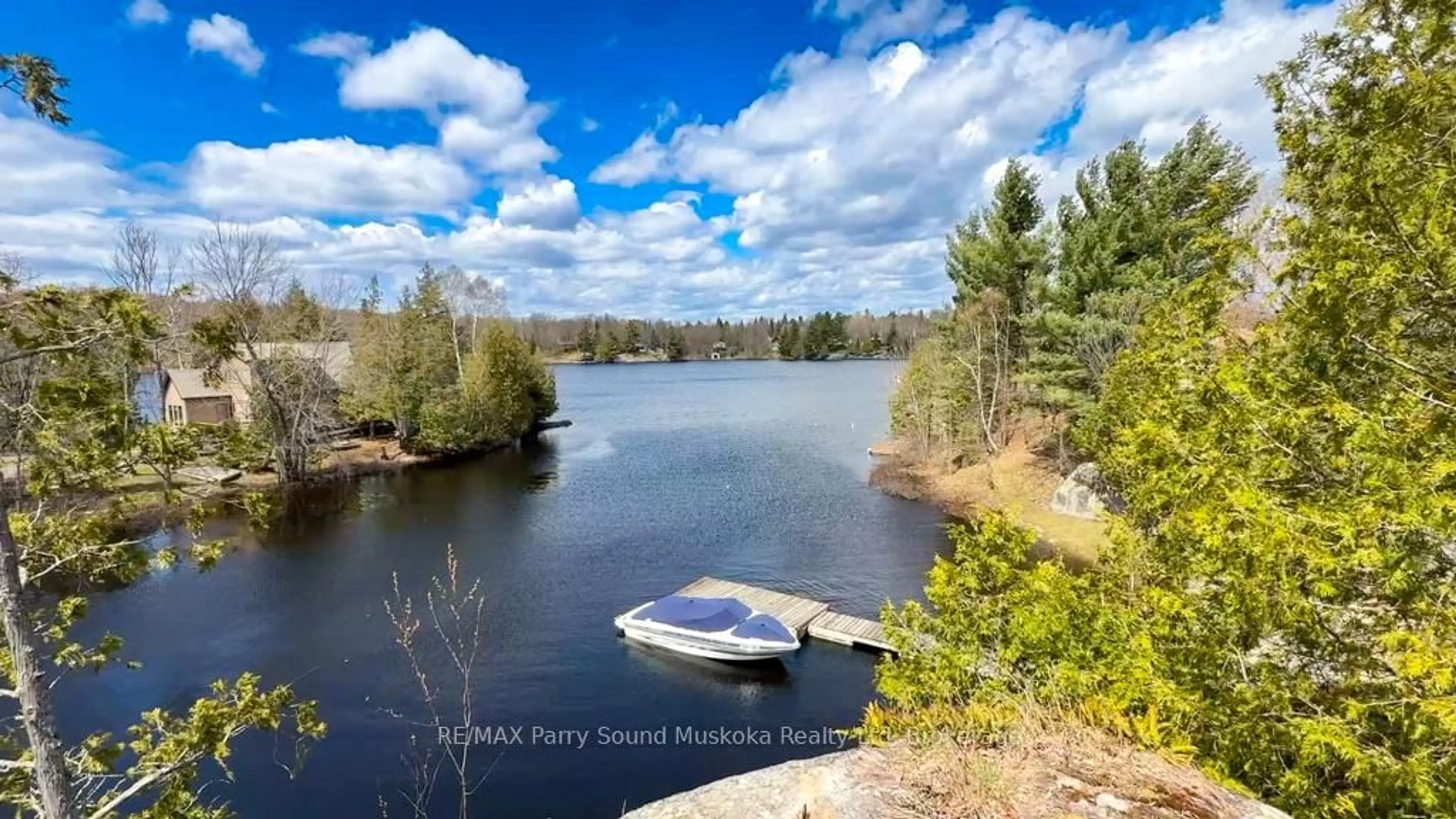A pic from outside/outdoor area/front of a property/back of a property/a pic from drone, water/lake/river/ocean view for 43 Bears Paw, Whitestone Ontario P0A 1G0