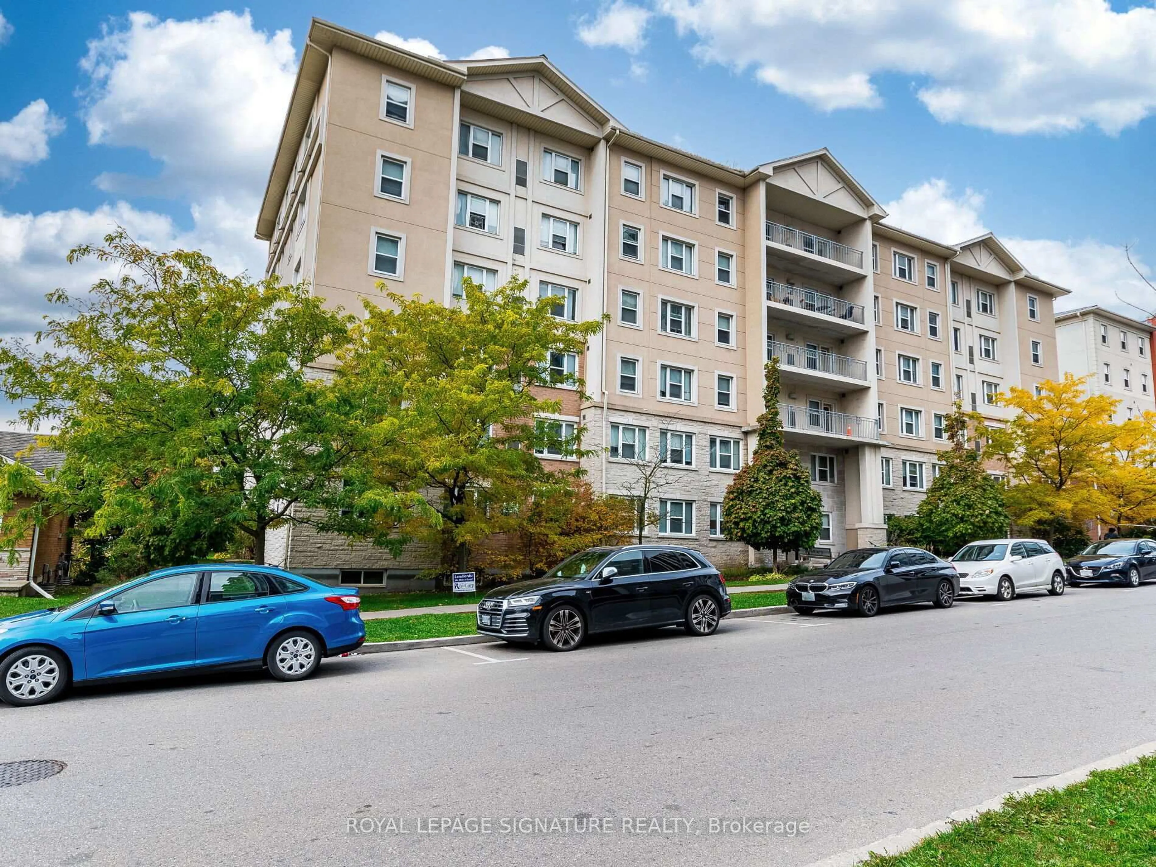 A pic from outside/outdoor area/front of a property/back of a property/a pic from drone, unknown for 251 Lester St #203, Waterloo Ontario N2L 3W6