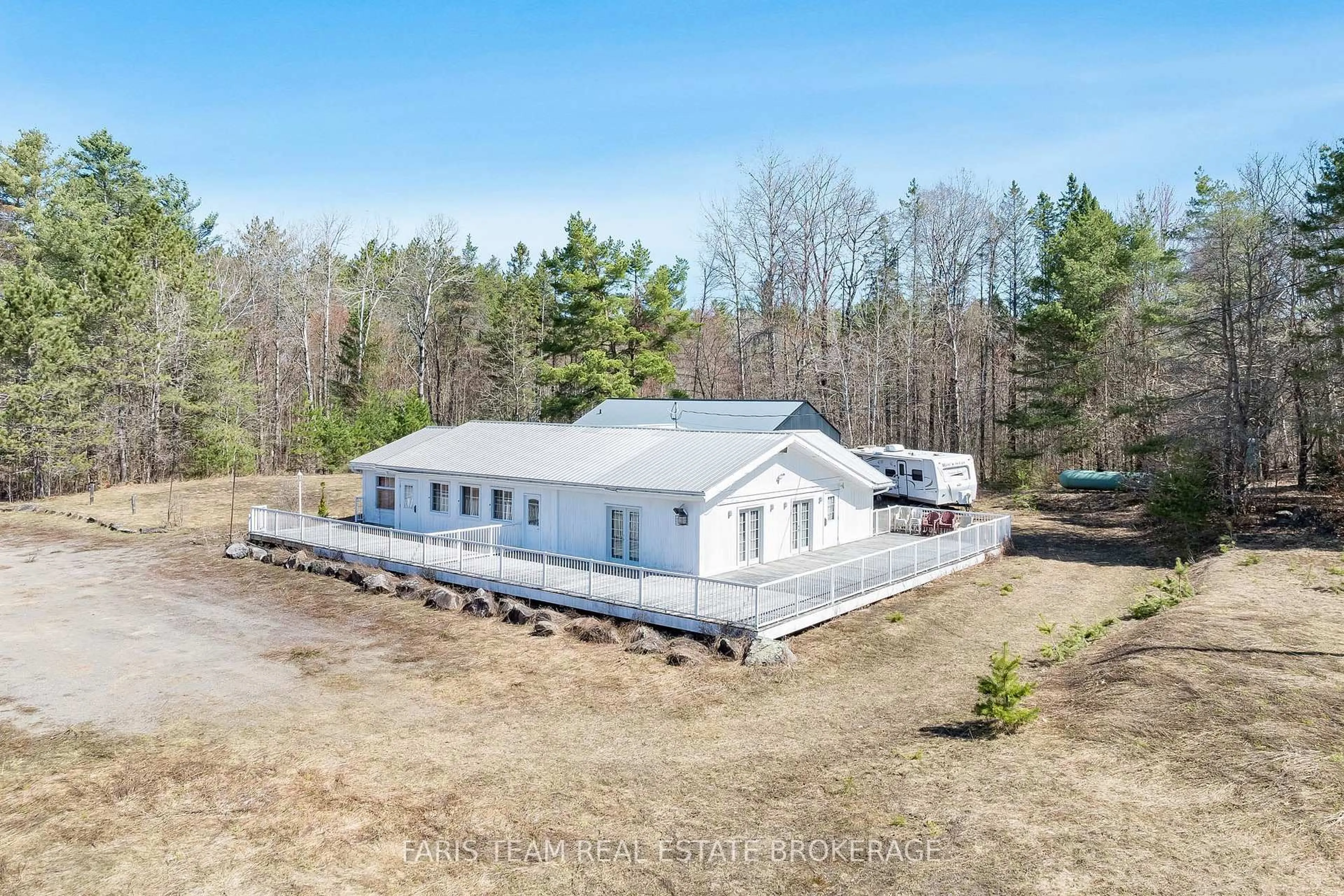 A pic from outside/outdoor area/front of a property/back of a property/a pic from drone, building for 2180-2186 Highway 141, Muskoka Lakes Ontario P0B 1L0