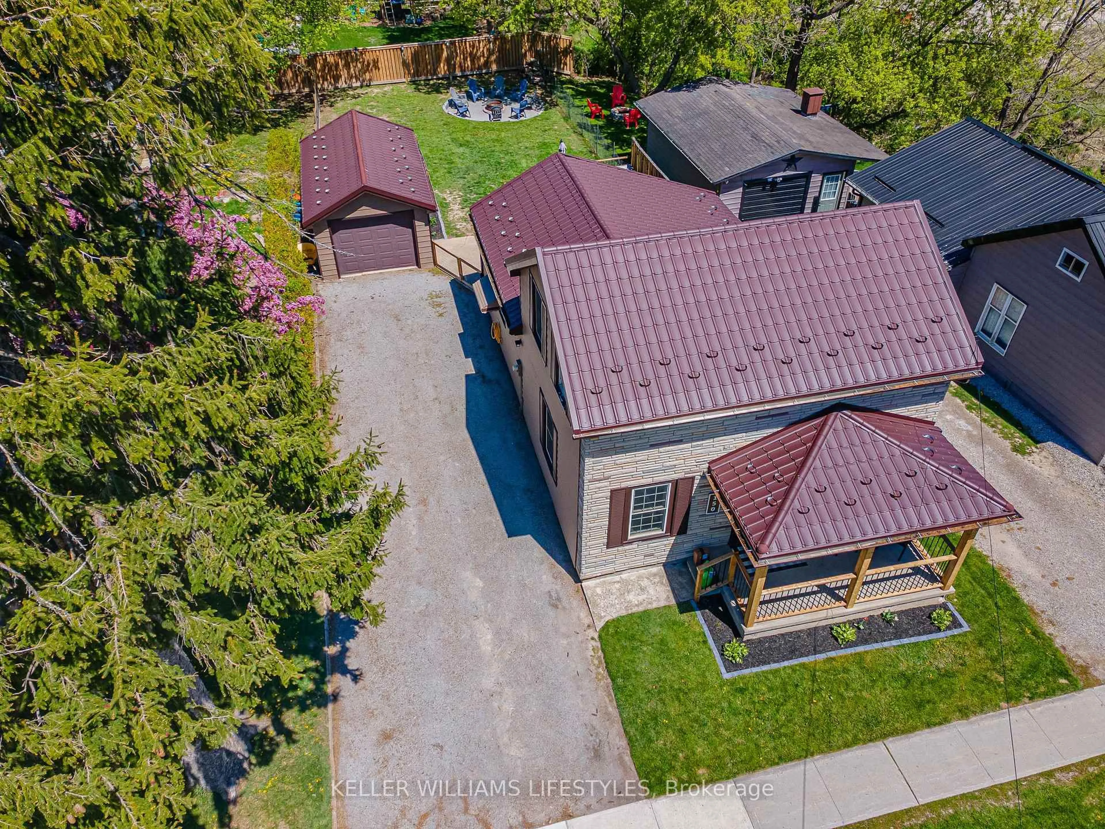 A pic from outside/outdoor area/front of a property/back of a property/a pic from drone, street for 150 Mill St, North Middlesex Ontario N0M 2K0