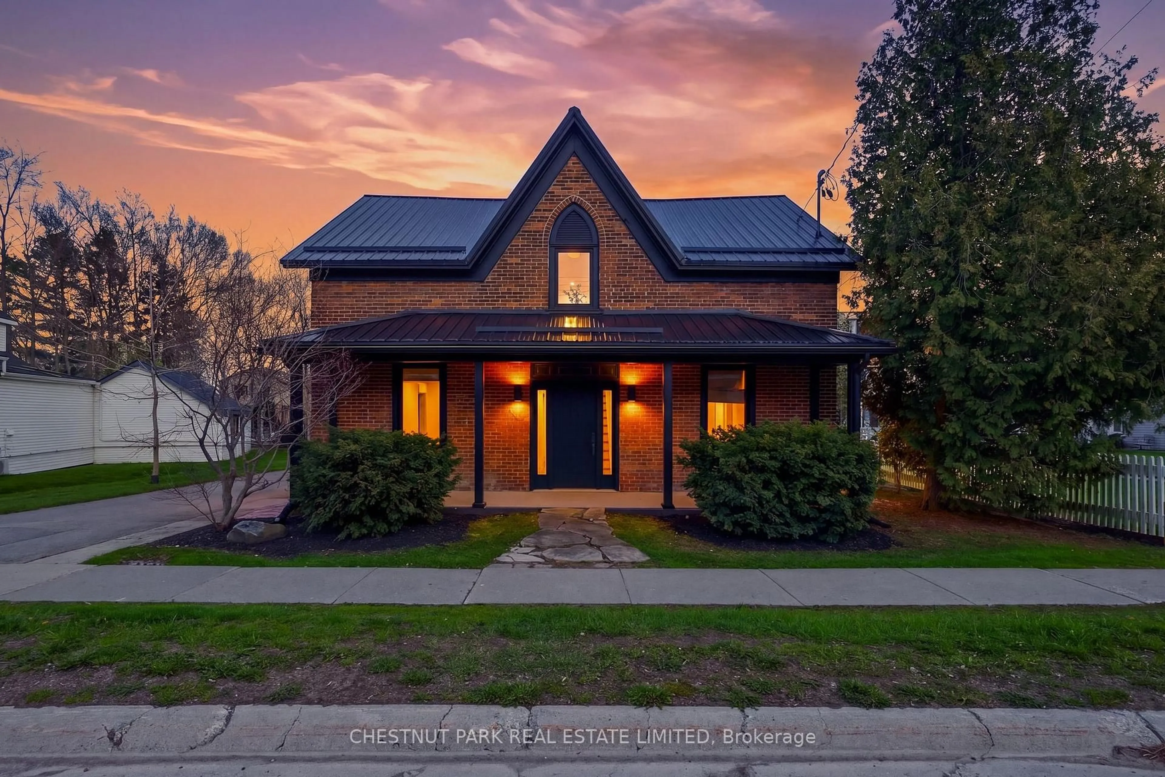 Home with brick exterior material, street for 335 Wellington Main St, Prince Edward County Ontario K0K 3L0