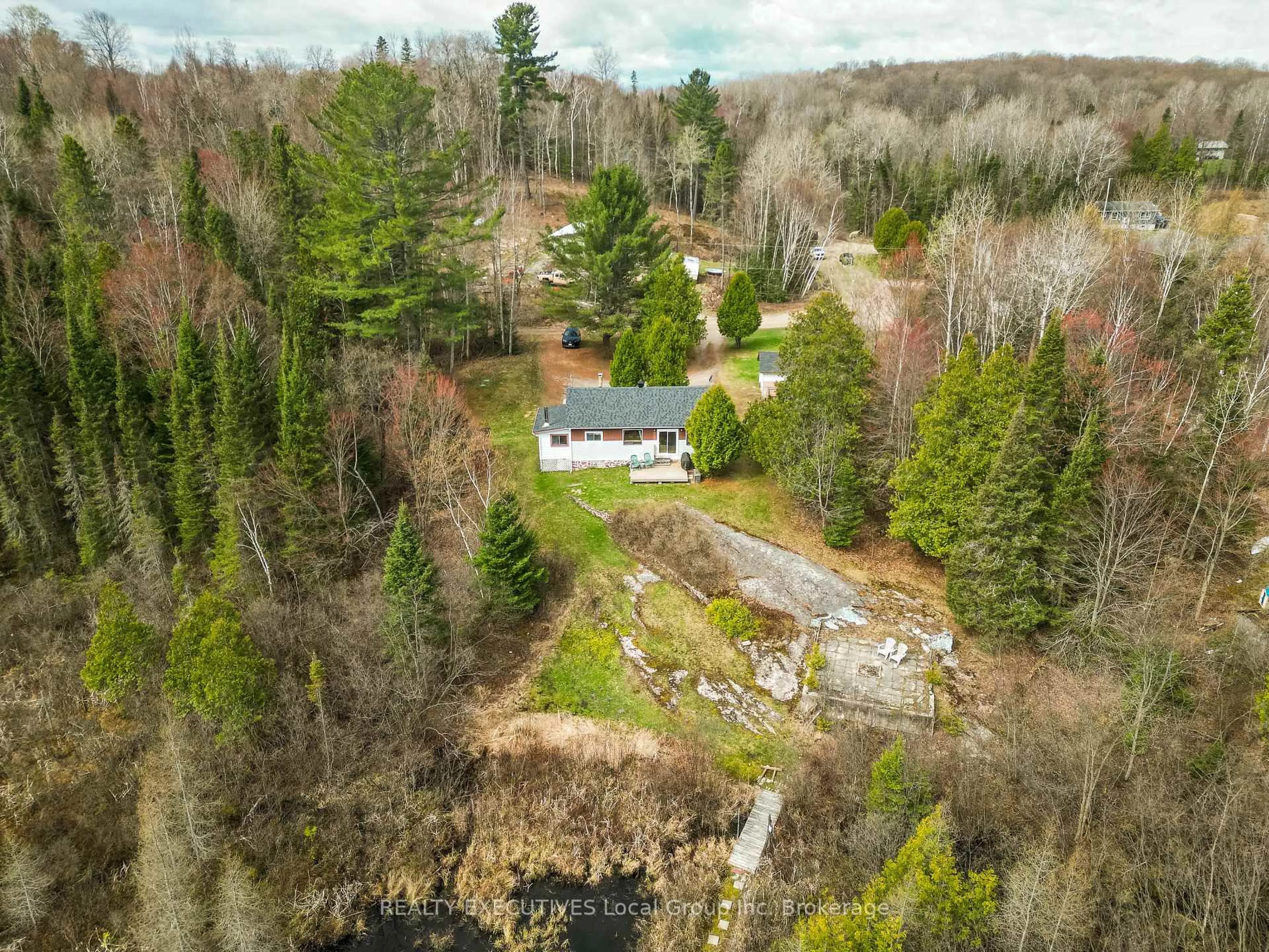 A pic from outside/outdoor area/front of a property/back of a property/a pic from drone, unknown for 115 Hillside Ave, Bonfield Ontario P0H 1E0