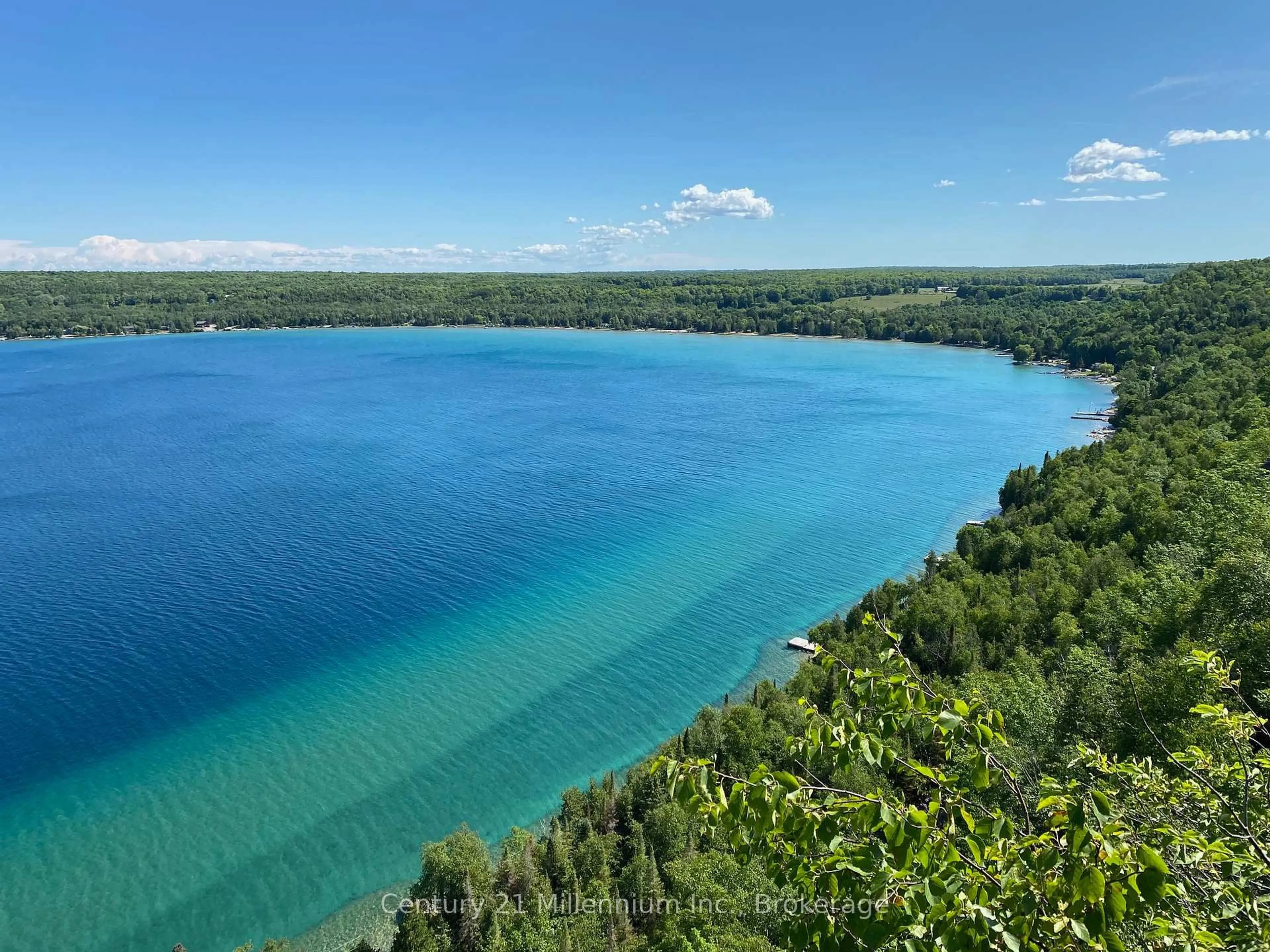 A pic from outside/outdoor area/front of a property/back of a property/a pic from drone, water/lake/river/ocean view for 113 Water St, Northern Bruce Peninsula Ontario N0H 1W0