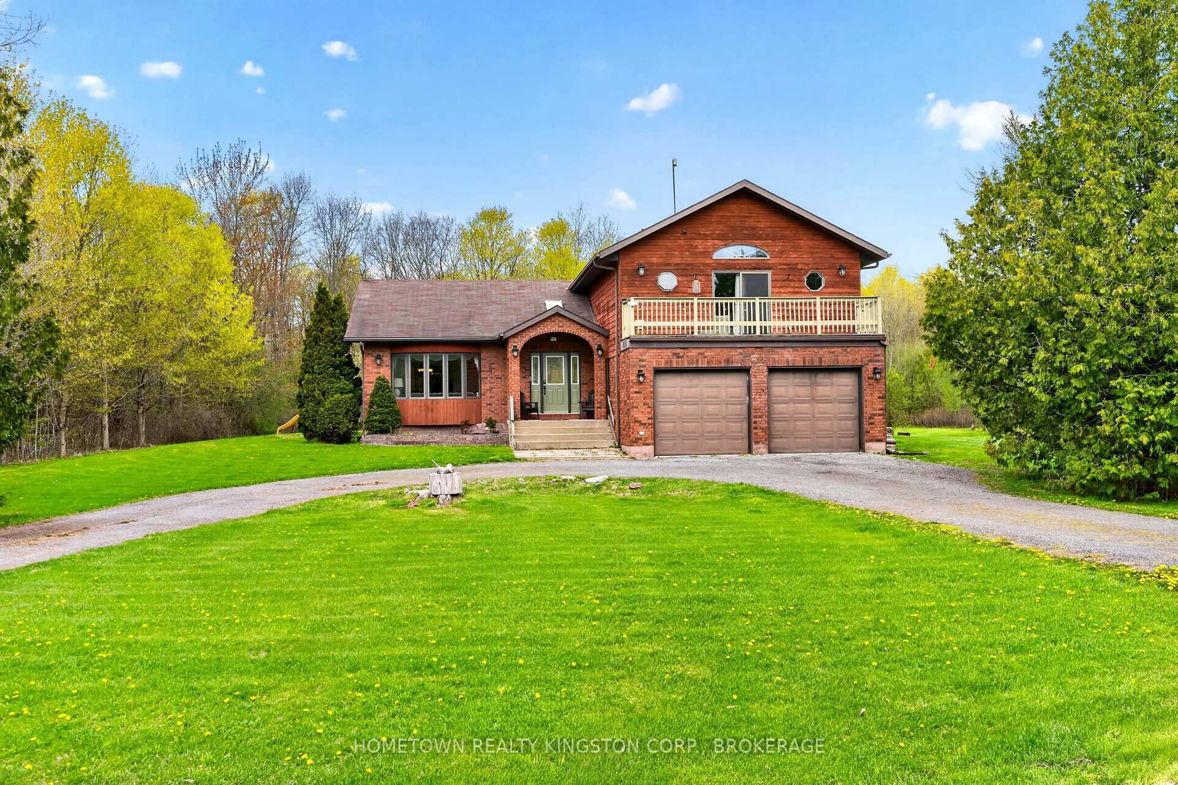 Home with brick exterior material, street for 1103 Cliffside Dr, Sydenham Ontario K0H 2T0