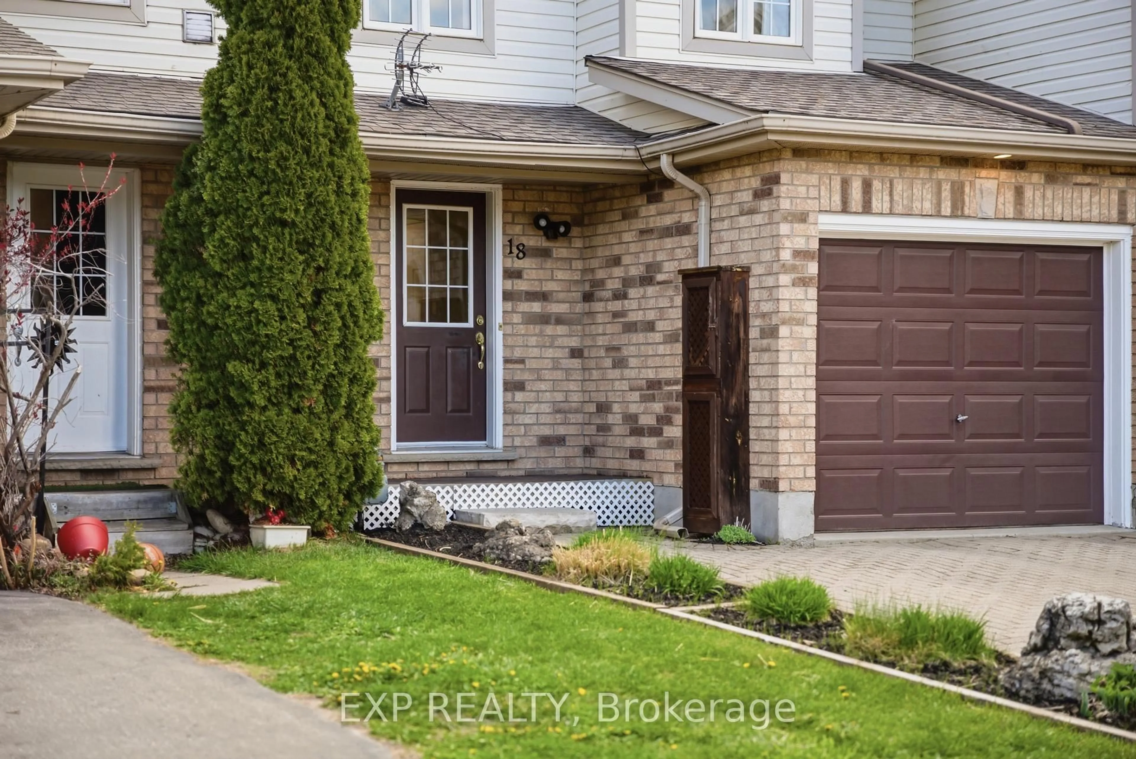 Home with brick exterior material, street for 18 Prosperity Dr, Kitchener Ontario N2E 3Z2