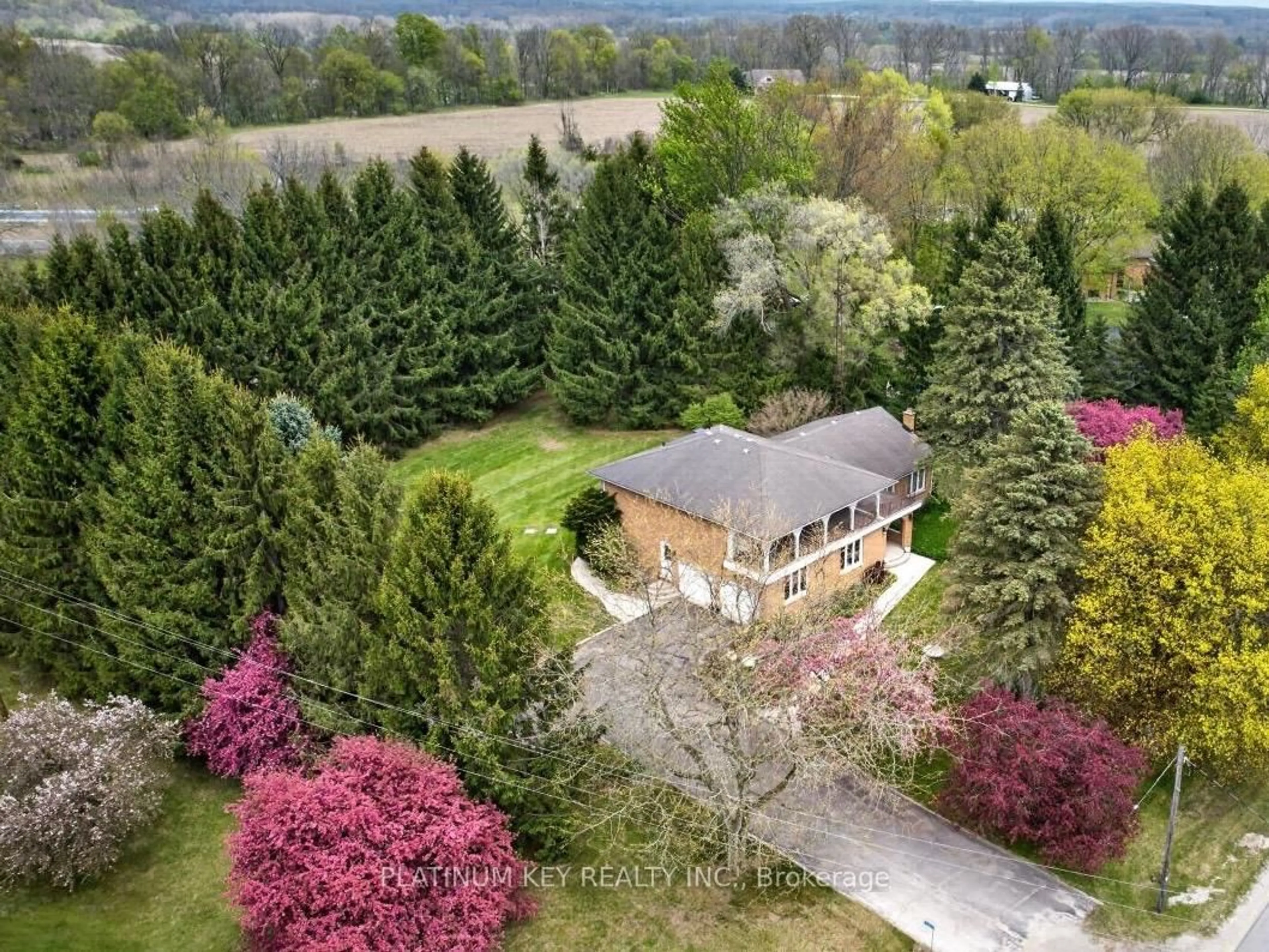 A pic from outside/outdoor area/front of a property/back of a property/a pic from drone, forest/trees view for 21610 Adelaide Rd, Strathroy-Caradoc Ontario N0L 1W0