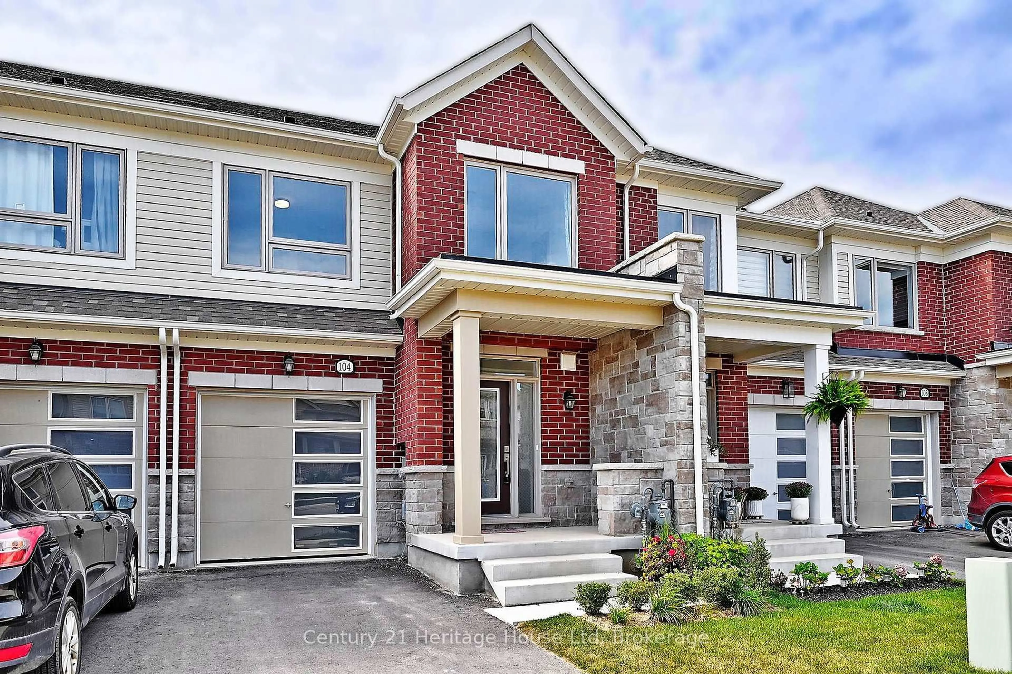 Home with brick exterior material, street for 104 Edminston Dr, Centre Wellington Ontario N1M 0J1