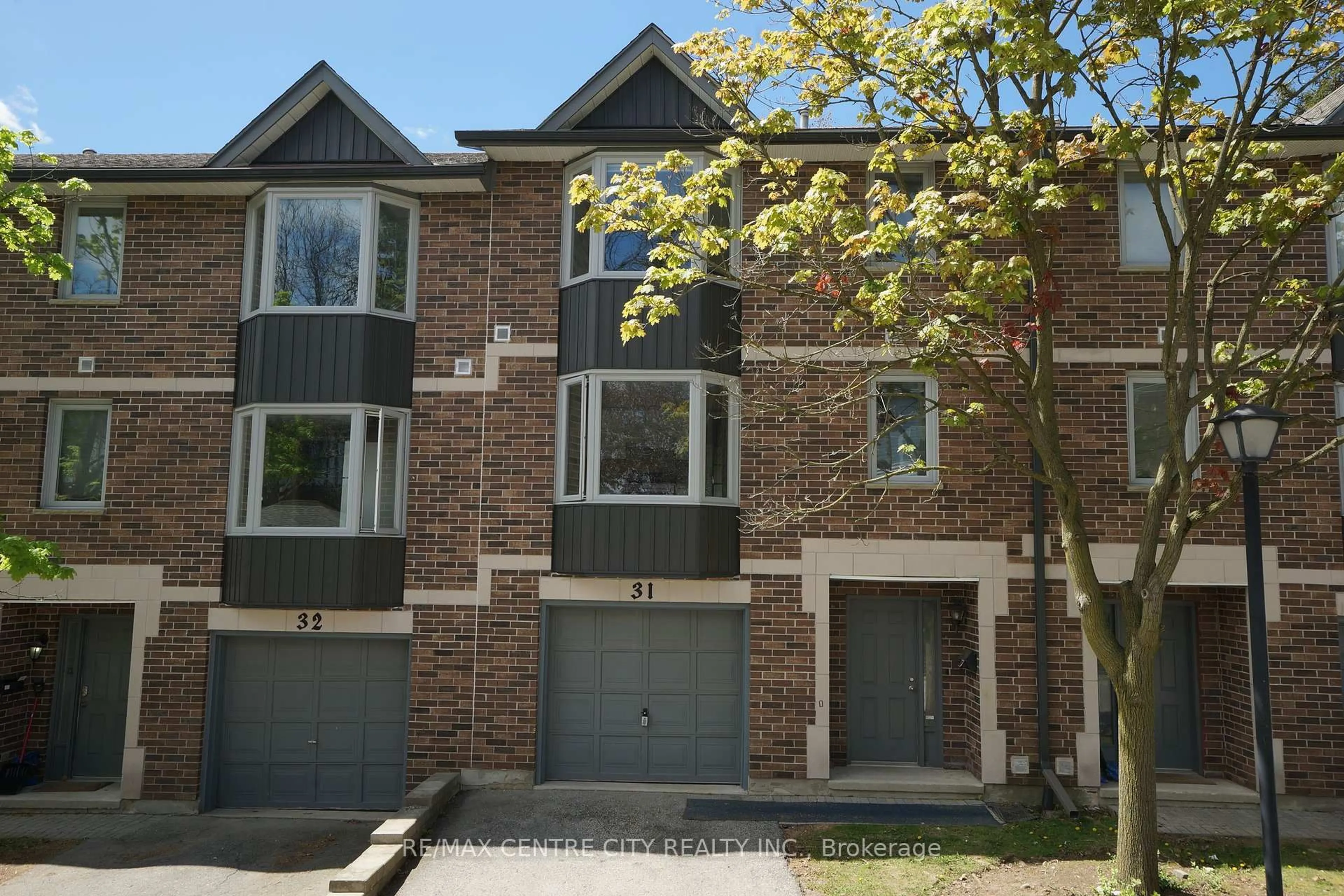 Home with brick exterior material, street for 1548 Richmond St #31, London North Ontario N6G 4W8