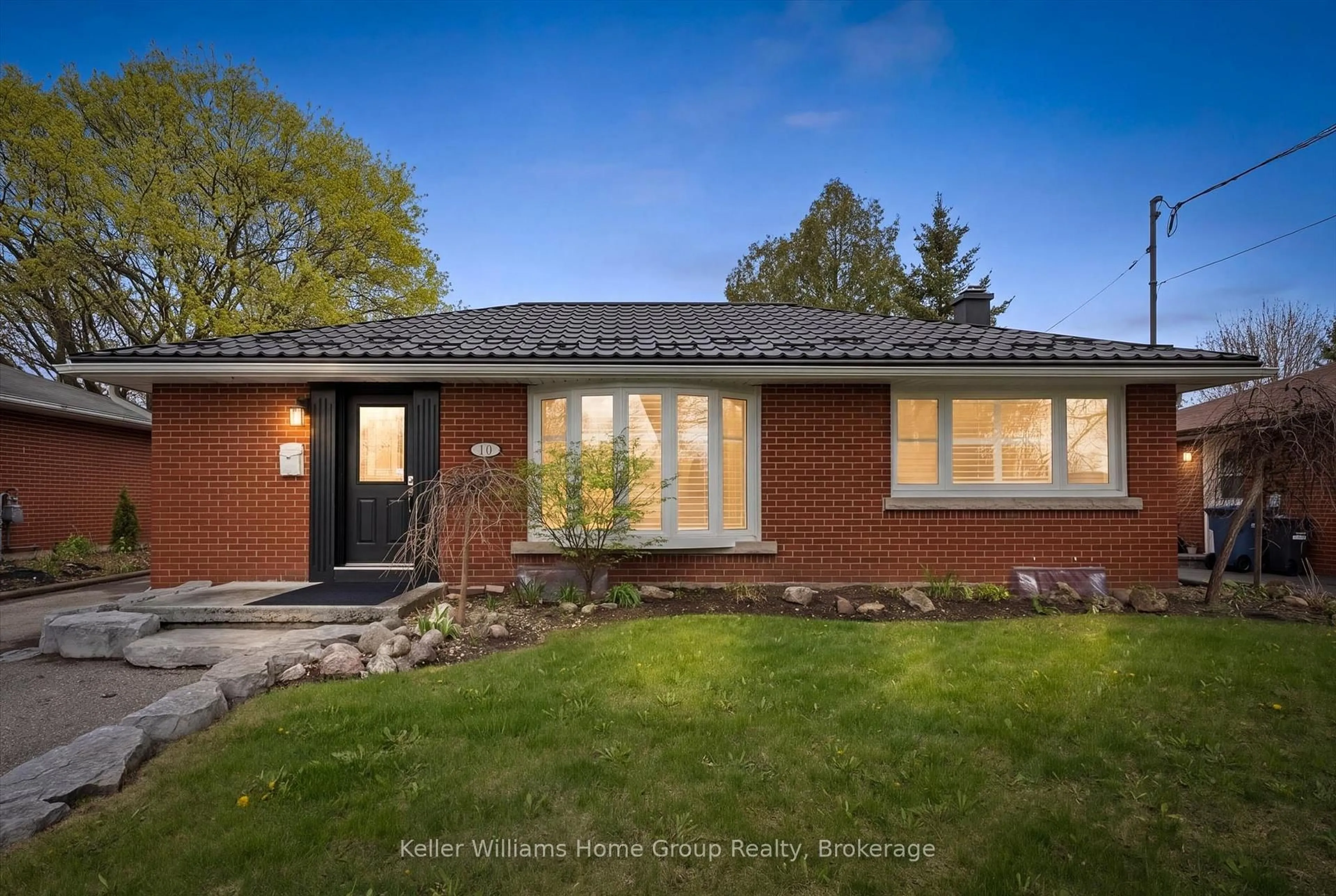Home with brick exterior material, street for 10 Sumac Pl, Guelph Ontario N1E 1K9