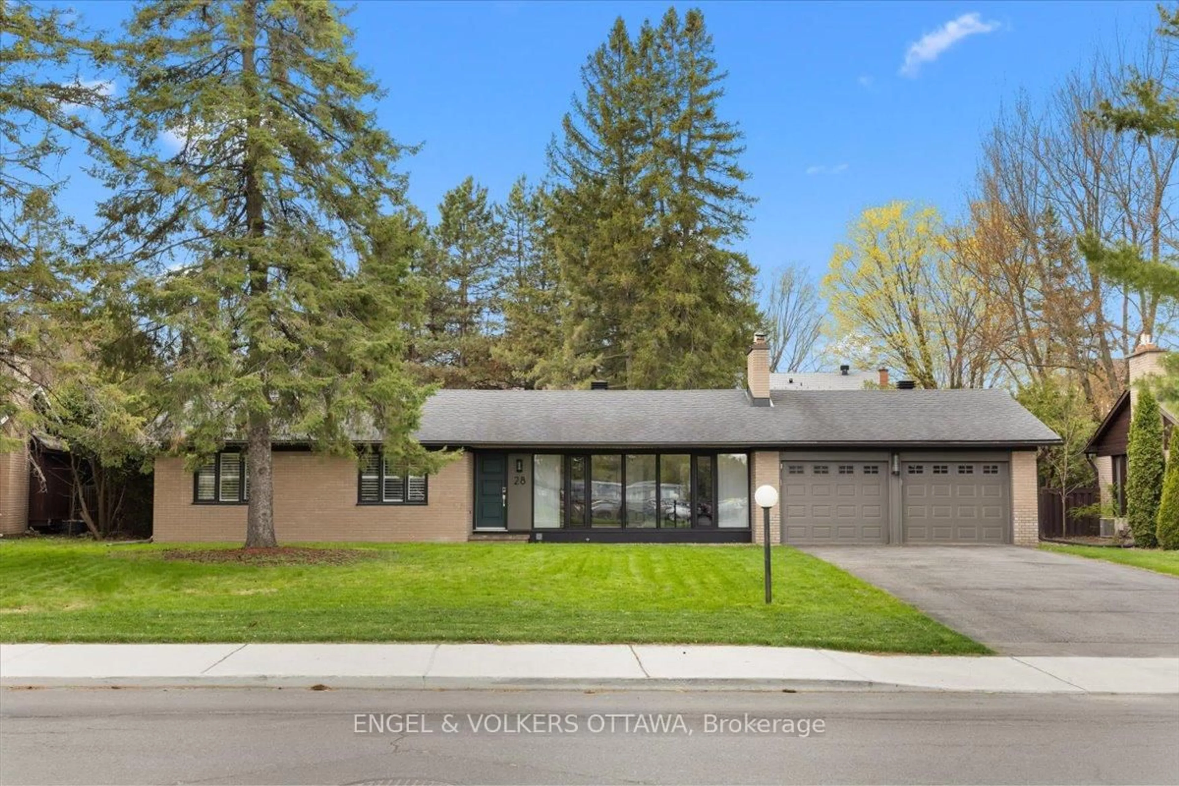 Home with vinyl exterior material, street for 28 Leacock Dr, Ottawa Ontario K2K 1S1