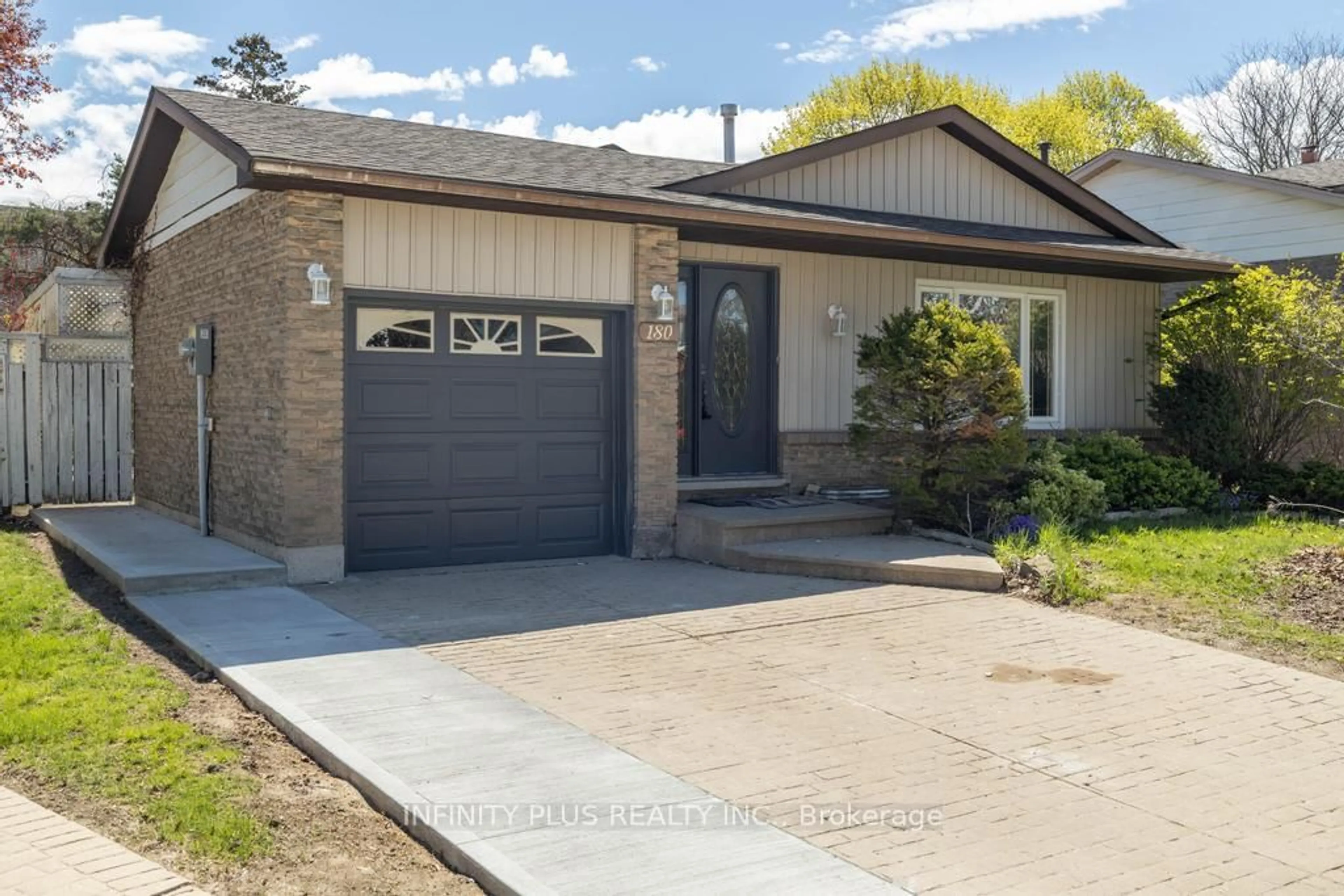 Home with brick exterior material, street for 180 St Jerome Cres, Kitchener Ontario N2C 2L2