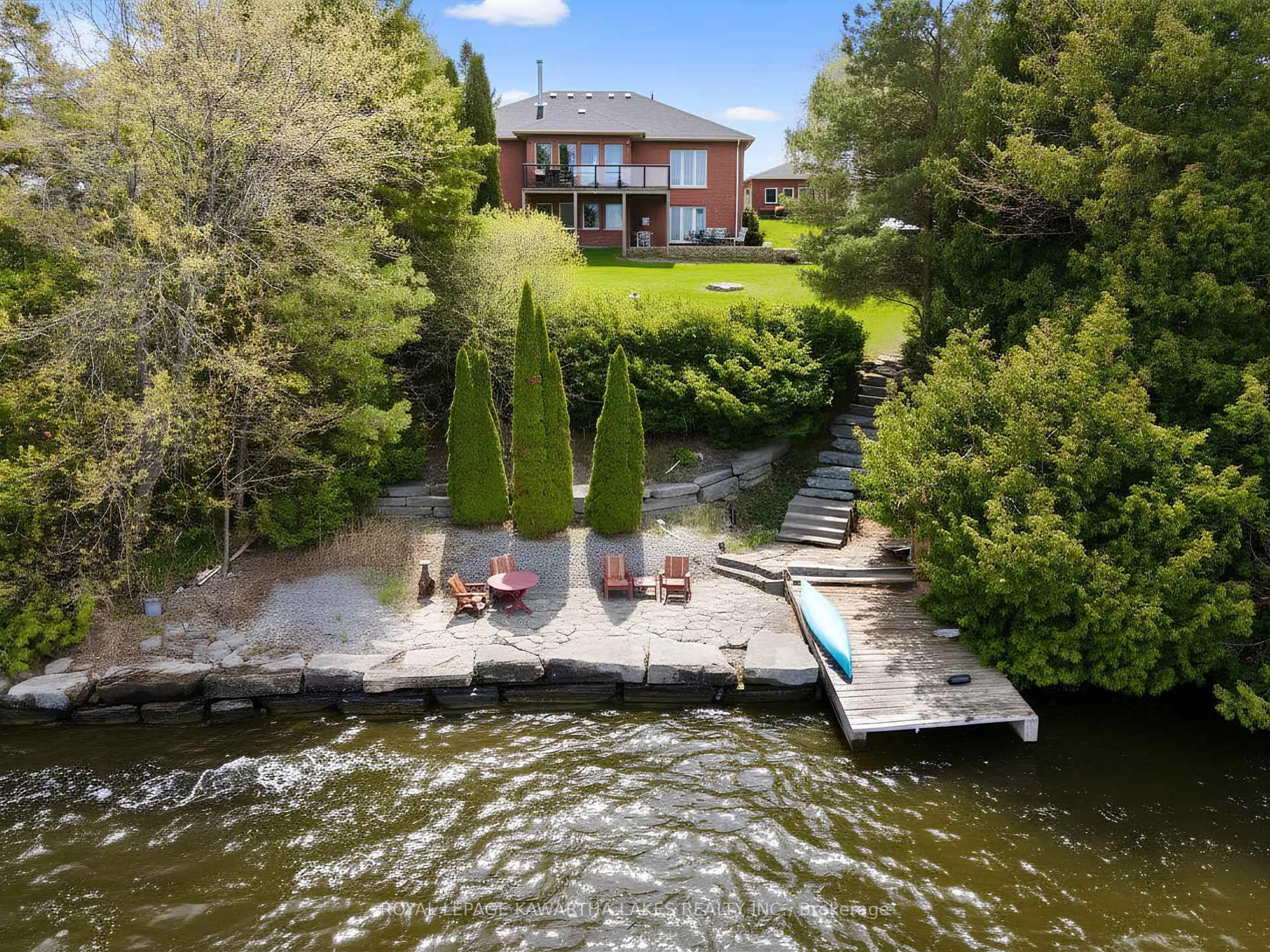 A pic from outside/outdoor area/front of a property/back of a property/a pic from drone, water/lake/river/ocean view for 21 Emerald St, Kawartha Lakes Ontario K9V 4R6