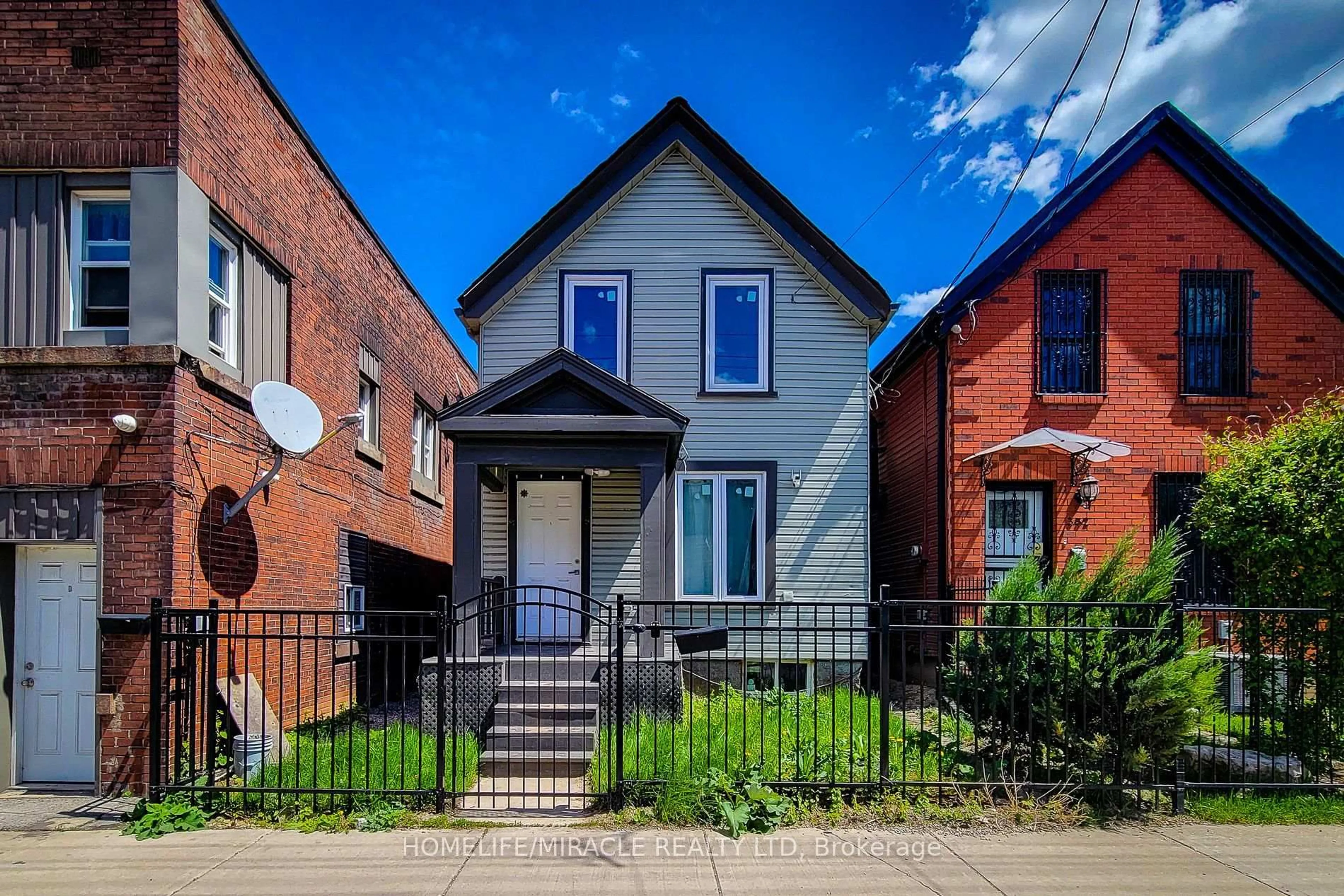 Home with brick exterior material, street for 334 Gage Ave, Hamilton Ontario L8L 7A7