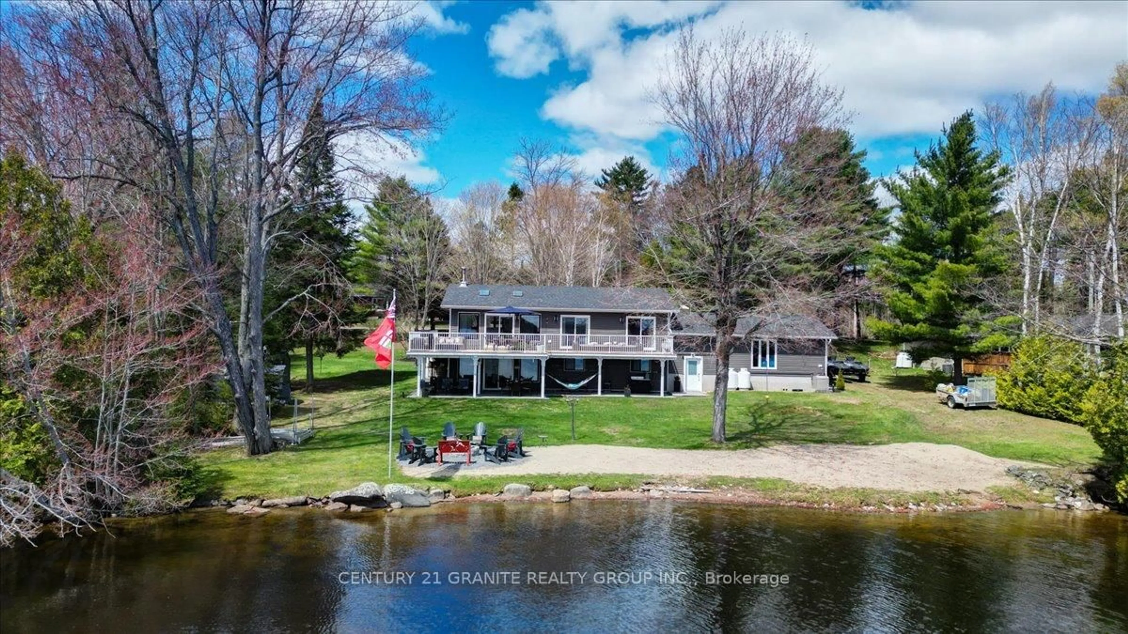 A pic from outside/outdoor area/front of a property/back of a property/a pic from drone, water/lake/river/ocean view for 1012 Black Rd, Arden Ontario K0H 1B0