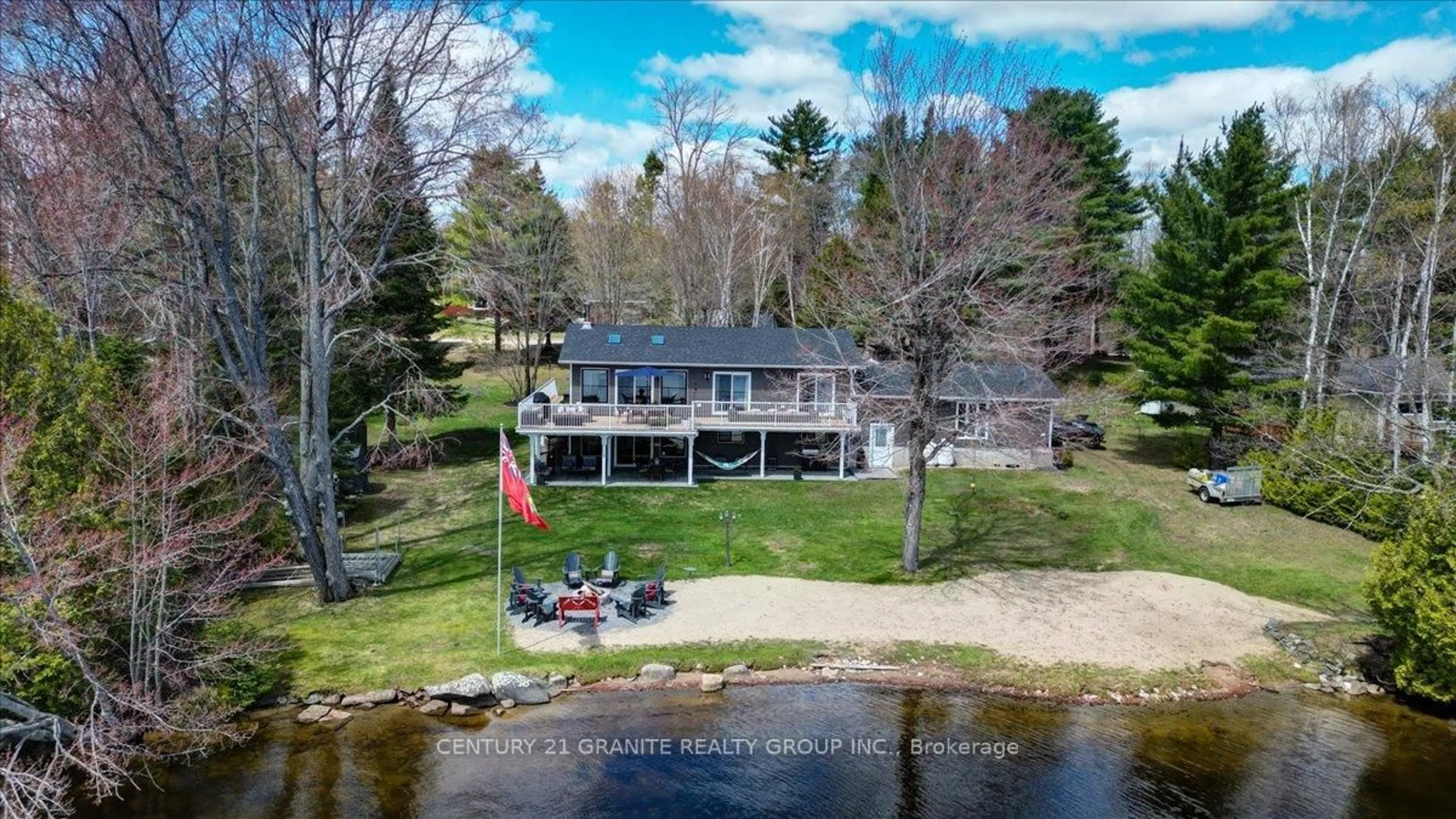 A pic from outside/outdoor area/front of a property/back of a property/a pic from drone, water/lake/river/ocean view for 1012 Black Rd, Arden Ontario K0H 1B0