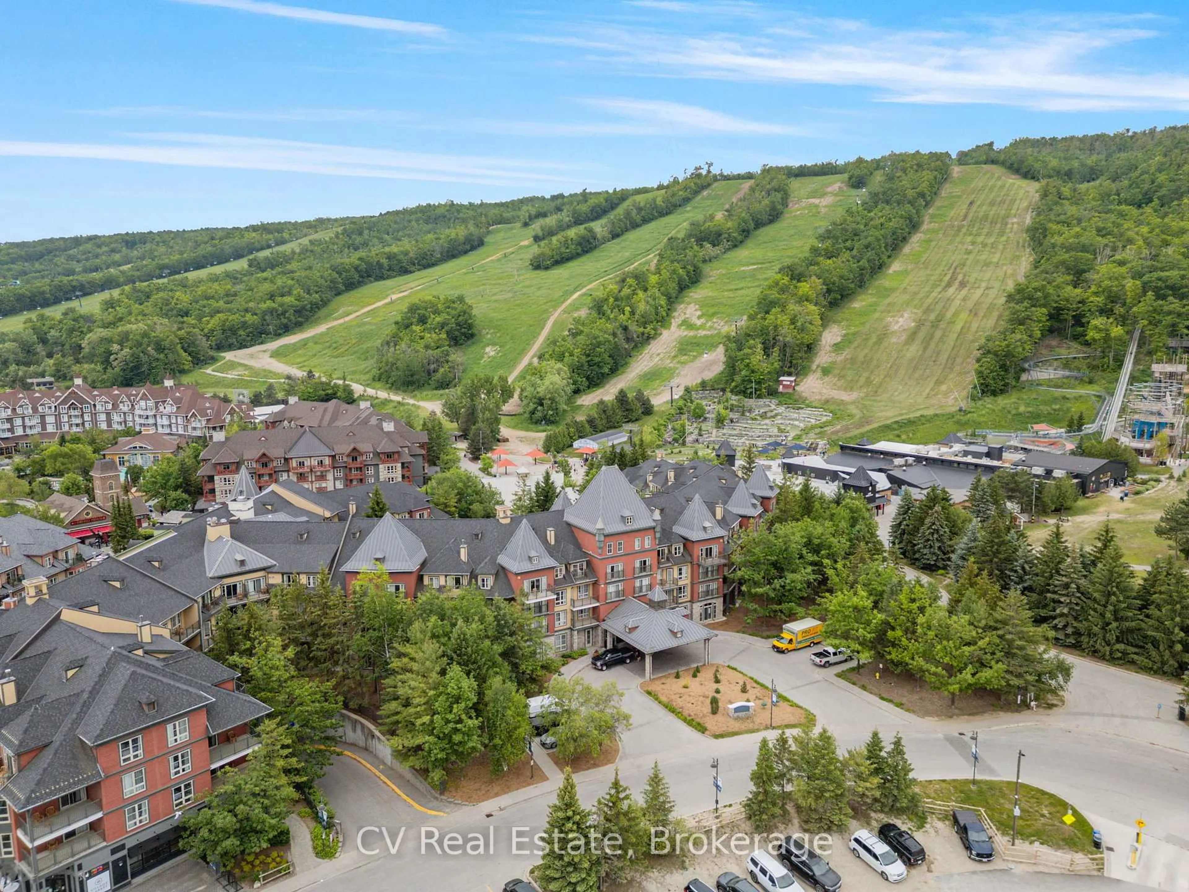 A pic from outside/outdoor area/front of a property/back of a property/a pic from drone, mountain view for 156 Jozo Weider Blvd #465, Blue Mountains Ontario L9Y 0V2