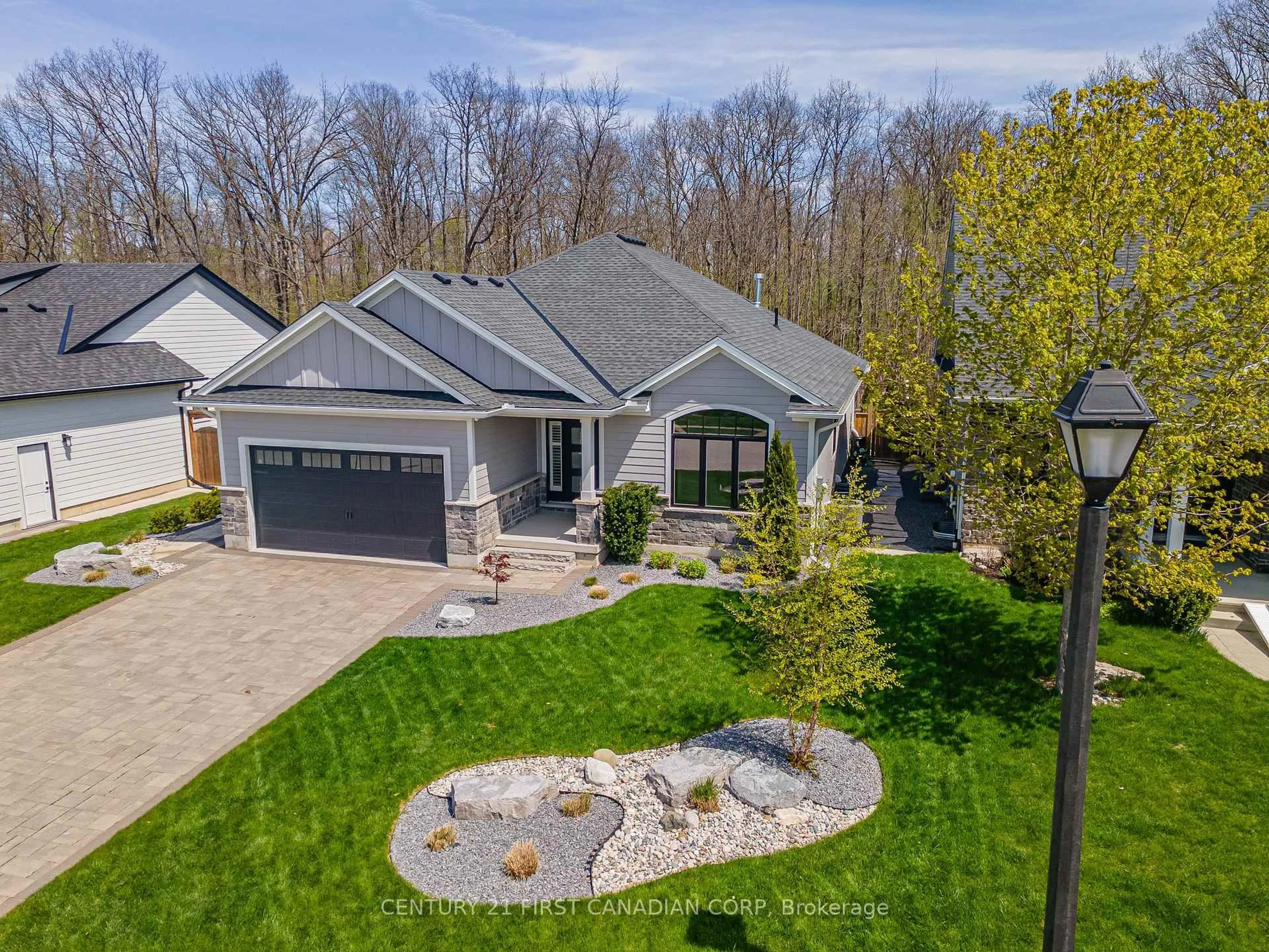 A pic from outside/outdoor area/front of a property/back of a property/a pic from drone, street for 65 Deerfield Rd, Lambton Shores Ontario N0M 1T0
