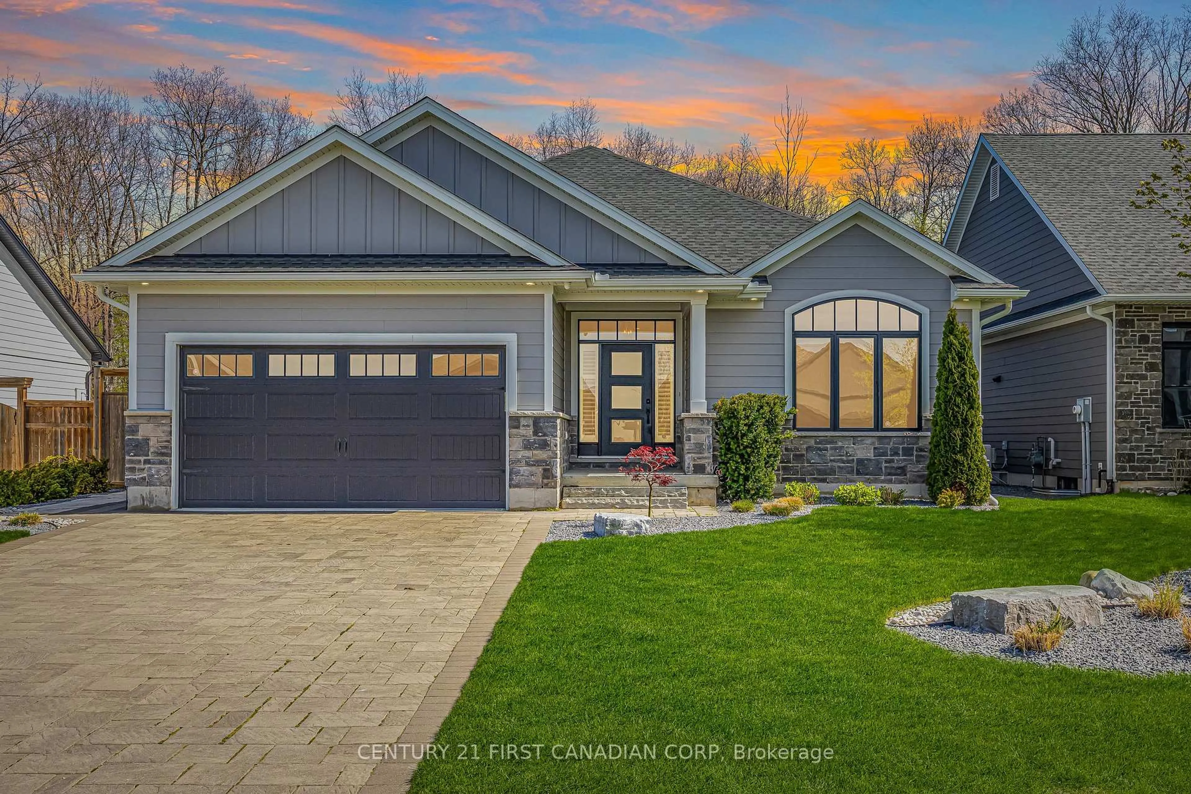 Home with brick exterior material, street for 65 Deerfield Rd, Lambton Shores Ontario N0M 1T0