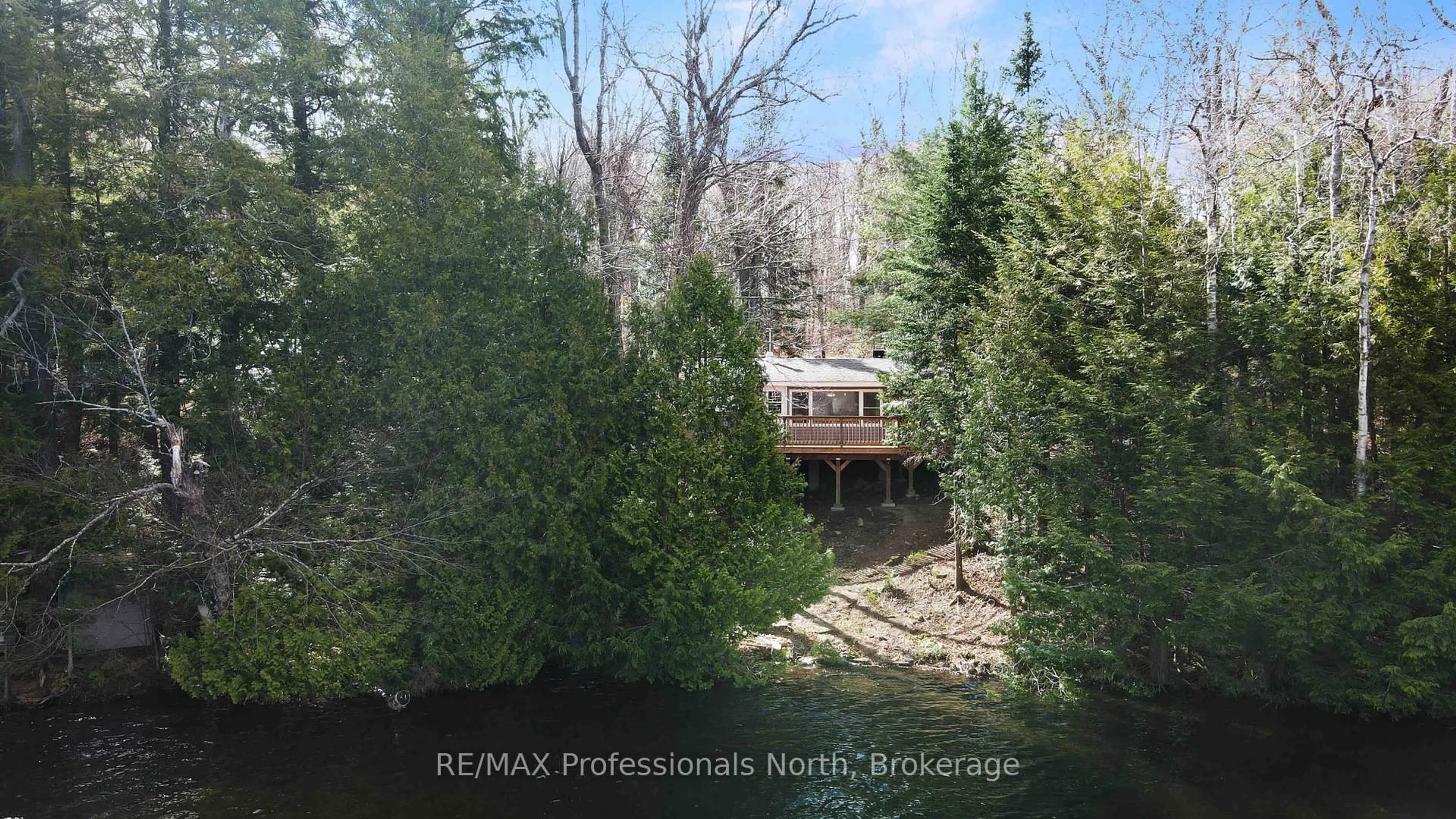 A pic from outside/outdoor area/front of a property/back of a property/a pic from drone, forest/trees view for 1396 Betula Cres, Dysart et al Ontario K0L 1M1