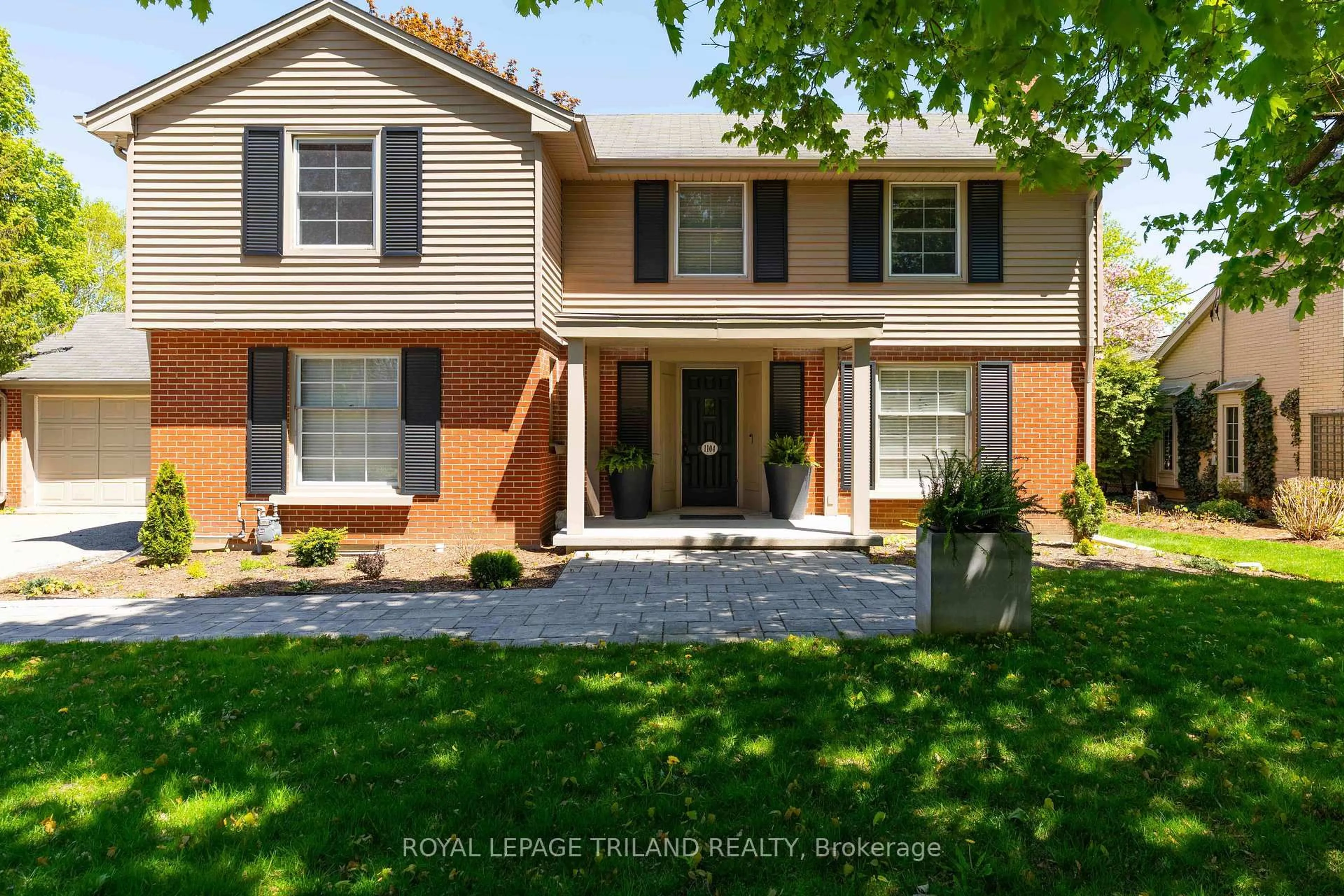 Home with brick exterior material, street for 1104 The Pkwy, London East Ontario N6A 2X3