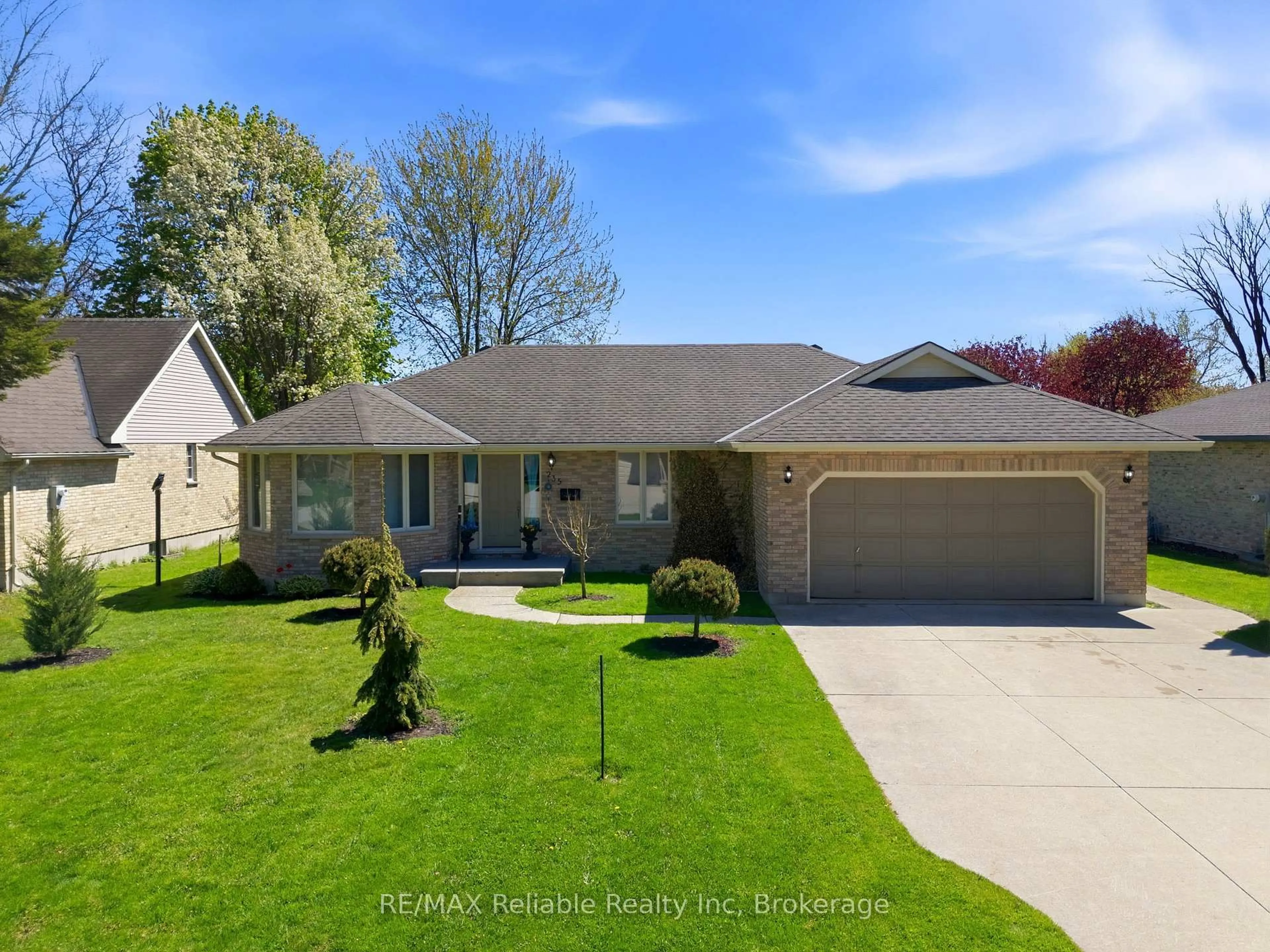 A pic from outside/outdoor area/front of a property/back of a property/a pic from drone, street for 235 Willis Way, South Huron Ontario N0M 1S2