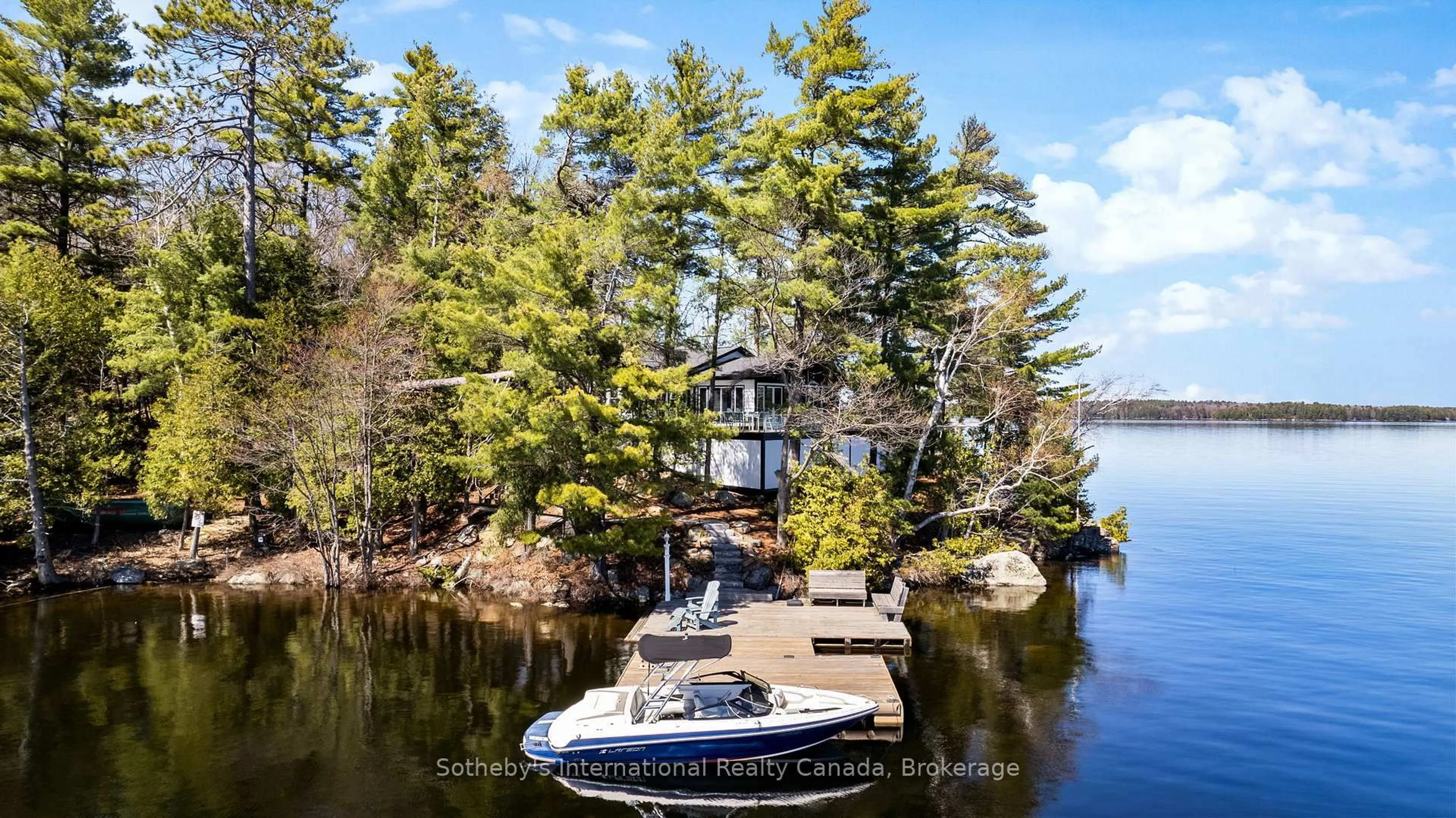 A pic from outside/outdoor area/front of a property/back of a property/a pic from drone, water/lake/river/ocean view for 29 BEACHGROVE ISLAND 33LM, Gravenhurst Ontario P1P 1R2