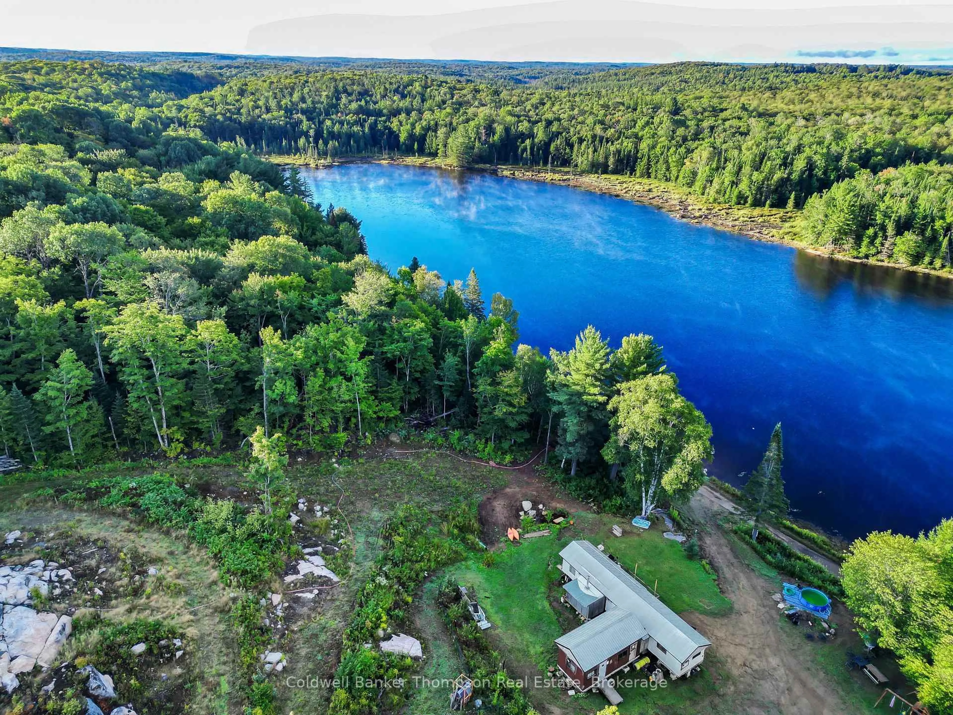 A pic from outside/outdoor area/front of a property/back of a property/a pic from drone, water/lake/river/ocean view for 0 Seguin Tr, Perry Ontario P0A 1J0