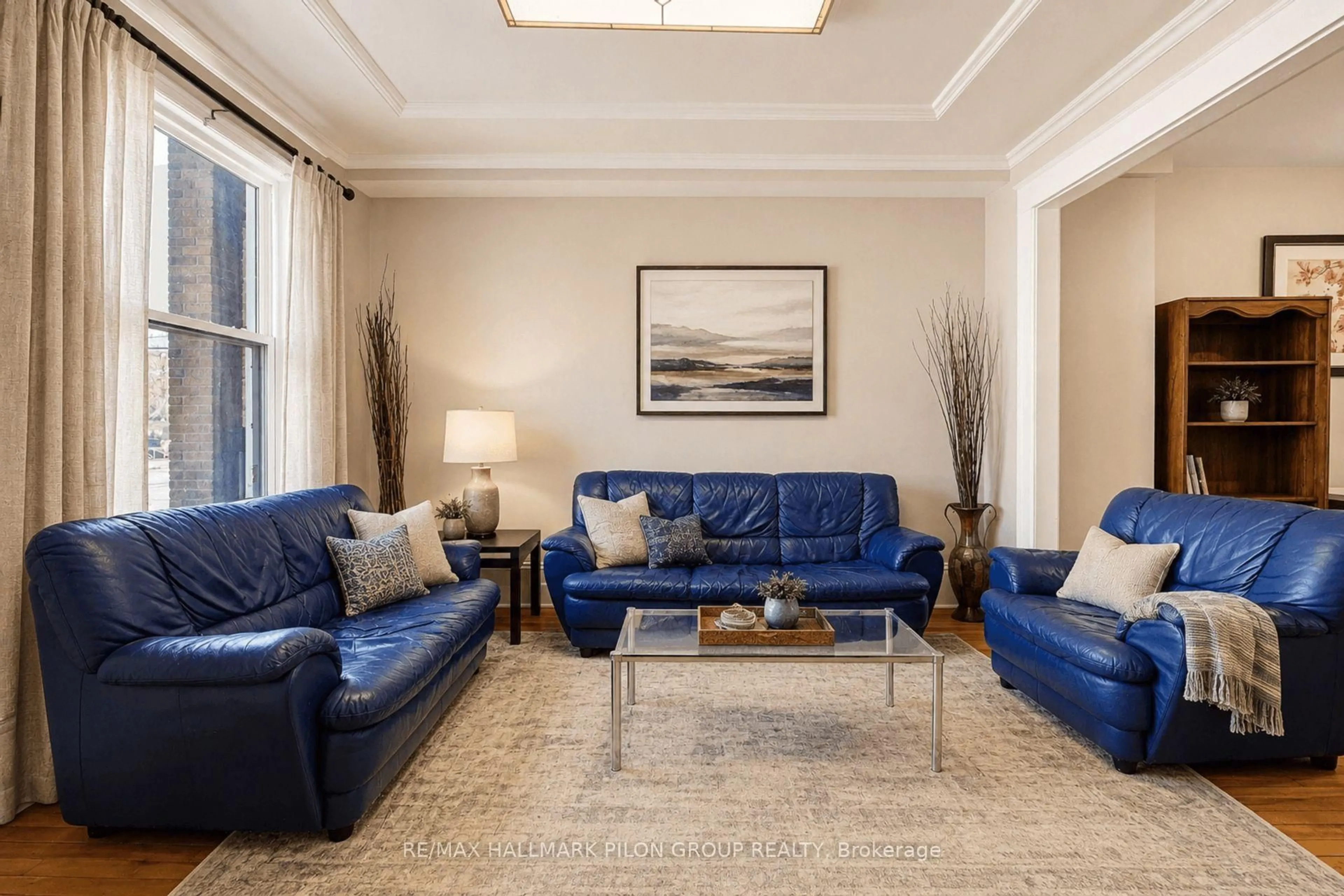 Living room with furniture, carpet floor for 132 Beausoleil Dr, Ottawa Ontario K1N 7V6