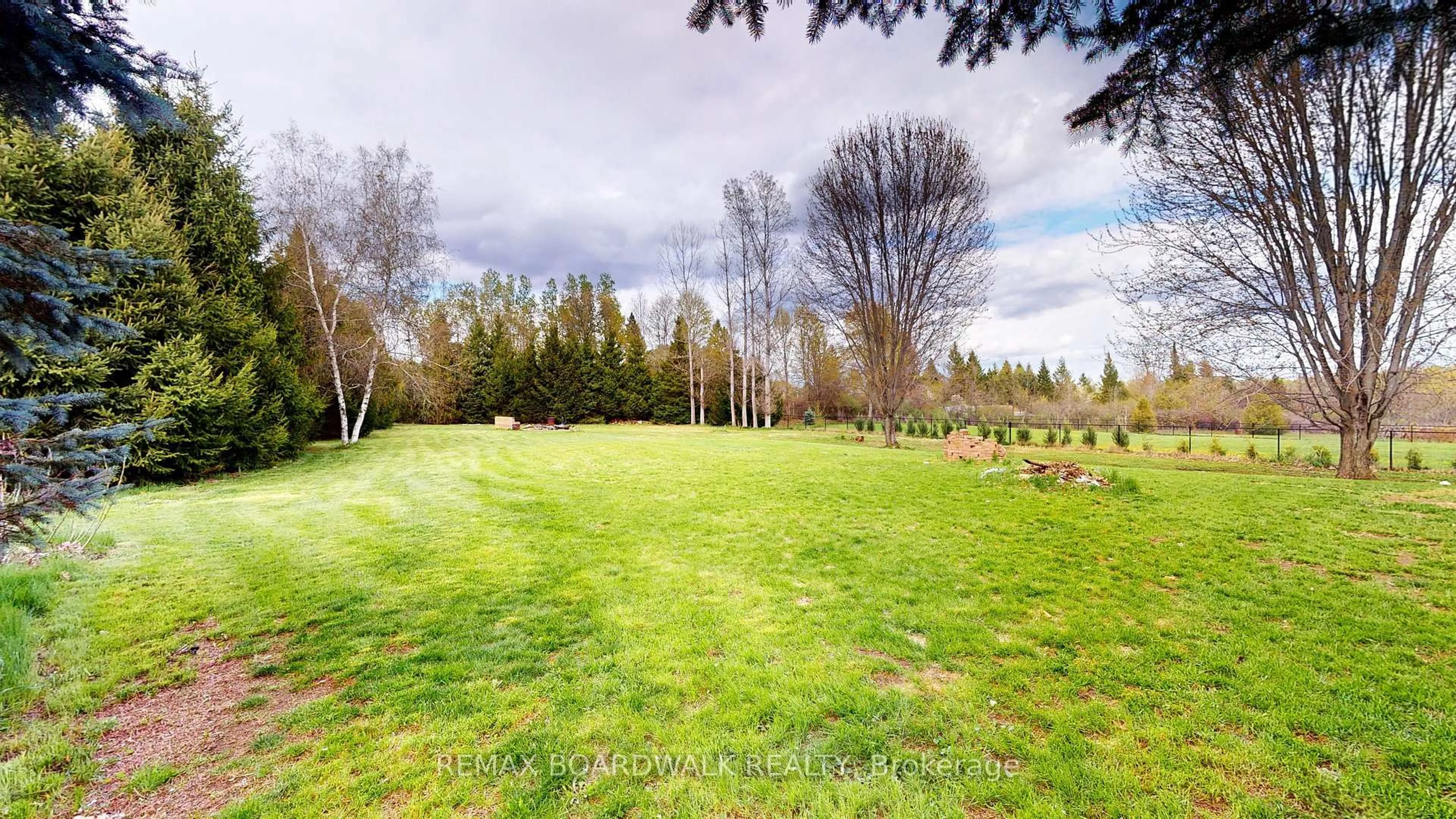 A pic from outside/outdoor area/front of a property/back of a property/a pic from drone, forest/trees view for 7 Meadowview Lane, North Grenville Ontario K0G 1T0