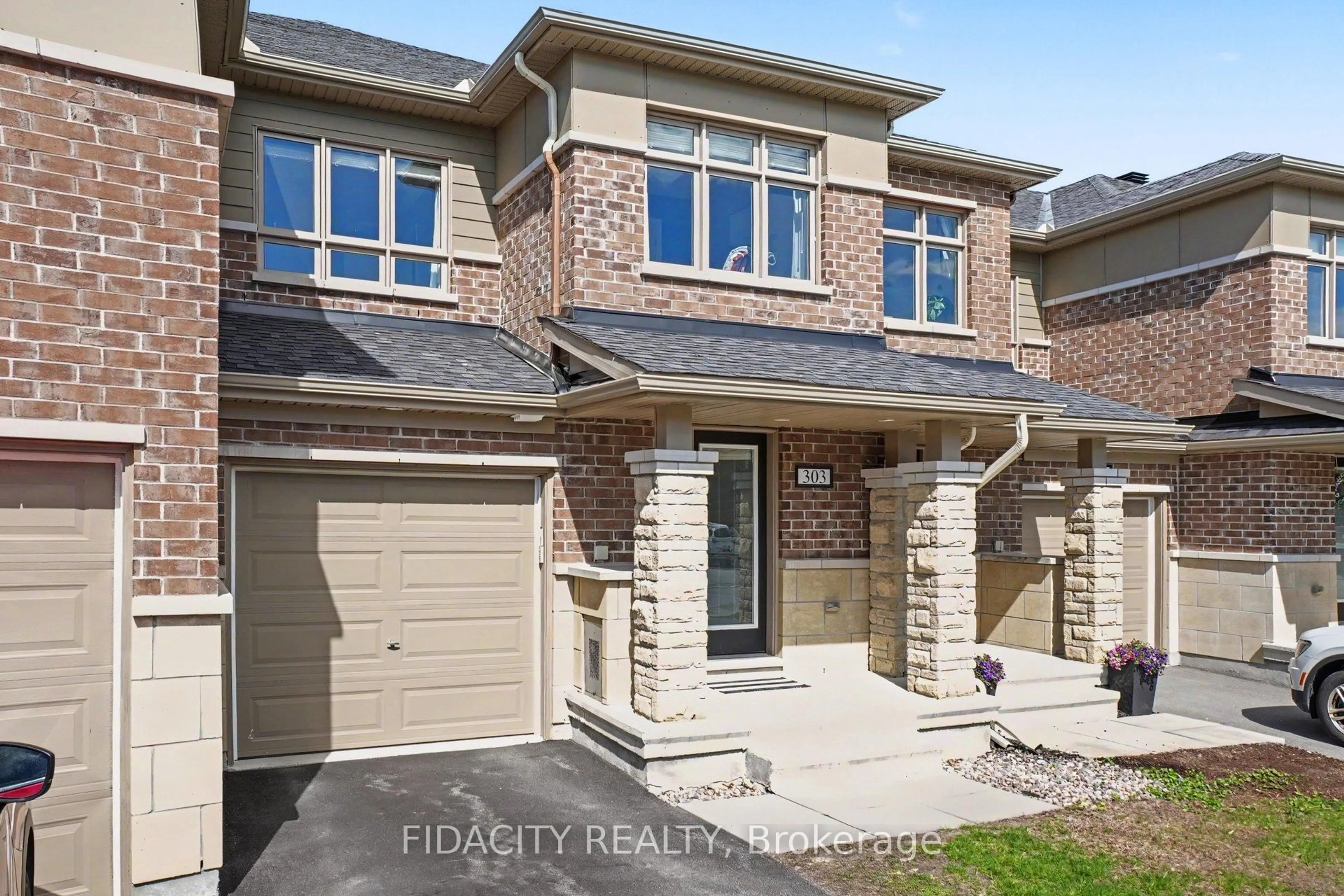 Home with brick exterior material, street for 303 Lipizzaner St, Ottawa Ontario K2S 0X8